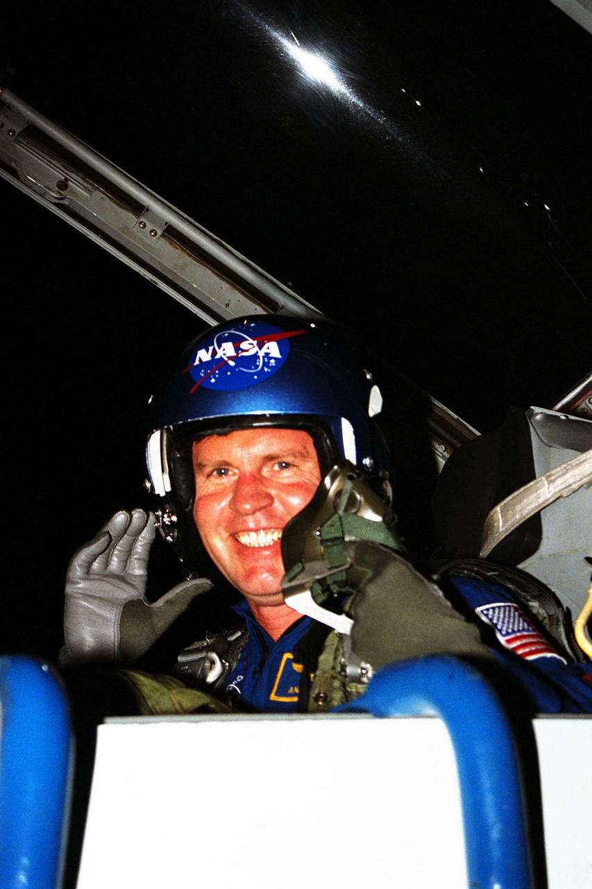 STS-89 Mission Specialist Andrew Thomas, Ph.D., poses in his T-38 jet trainer after landing with other members of the flight crew at KSC’s Shuttle Landing Facility from NASA’s Johnson Space Center to begin Terminal Countdown Demonstration Test (TCDT) activities. The TCDT is held at KSC prior to each Space Shuttle flight to provide crews with the opportunity to participate in simulated countdown activities. Endeavour is targeted for launch of STS-89 on Jan. 22 at 9:48 p.m. EST., which will be the first mission of 1998 and the eighth to dock with Russia’s Mir Space Station, where Thomas will succeed David Wolf, M.D., who has been on Mir since September 28. The STS-89 mission is scheduled to last nine days