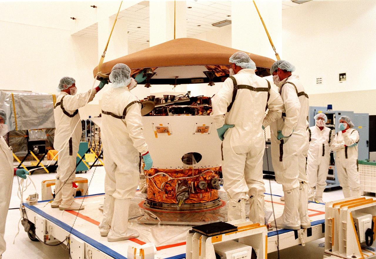 KENNEDY SPACE CENTER, FLA. -- In the Spacecraft Assembly and Encapsulation Facility-2 (SAEF-2), the top of the Mars Polar Lander is removed for testing, which includes a functional test of the science instruments and the basic spacecraft subsystems. The Mars Polar Lander is targeted for launch from Cape Canaveral Air Station aboard a Delta II rocket on Jan. 3, 1999. The solar-powered spacecraft is designed to touch down on the Martian surface near the northern-most boundary of the south pole in order to study the water cycle there. The lander also will help scientists learn more about climate change and current resources on Mars, studying such things as frost, dust, water vapor and condensates in the Martian atmosphere