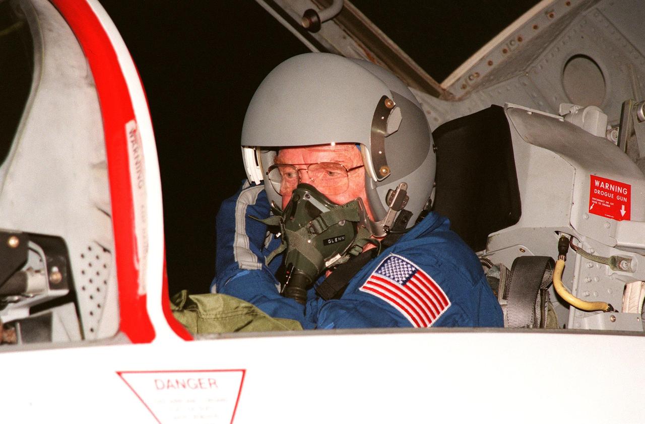 STS-95 Payload Specialist John H. Glenn Jr. arrives aboard a T-38 jet aircraft at the Shuttle Landing Facility at KSC to participate in a Terminal Countdown Demonstration Test (TCDT) for the launch scheduled for liftoff on Oct. 29, 1998. The TCDT includes activities to familiarize them with the mission, training in emergency exit from the orbiter and launch pad, and a simulated main engine cut-off exercise. Other crew members on the mission are Mission Commander Curtis L. Brown , Pilot Steven W. Lindsey; Mission Specialists Scott E. Parazynski, Stephen K. Robinson, and Pedro Duque of Spain, representing the European Space Agency (ESA); and Payload Specialist Chiaki Mukai, representing the National Space Development Agency of Japan (NASDA). The STS-95 mission includes research payloads such as the Spartan solar-observing deployable spacecraft, the Hubble Space Telescope Orbital Systems Test Platform, the International Extreme Ultraviolet Hitchhiker, as well as the SPACEHAB single module with experiments on space flight and the aging process