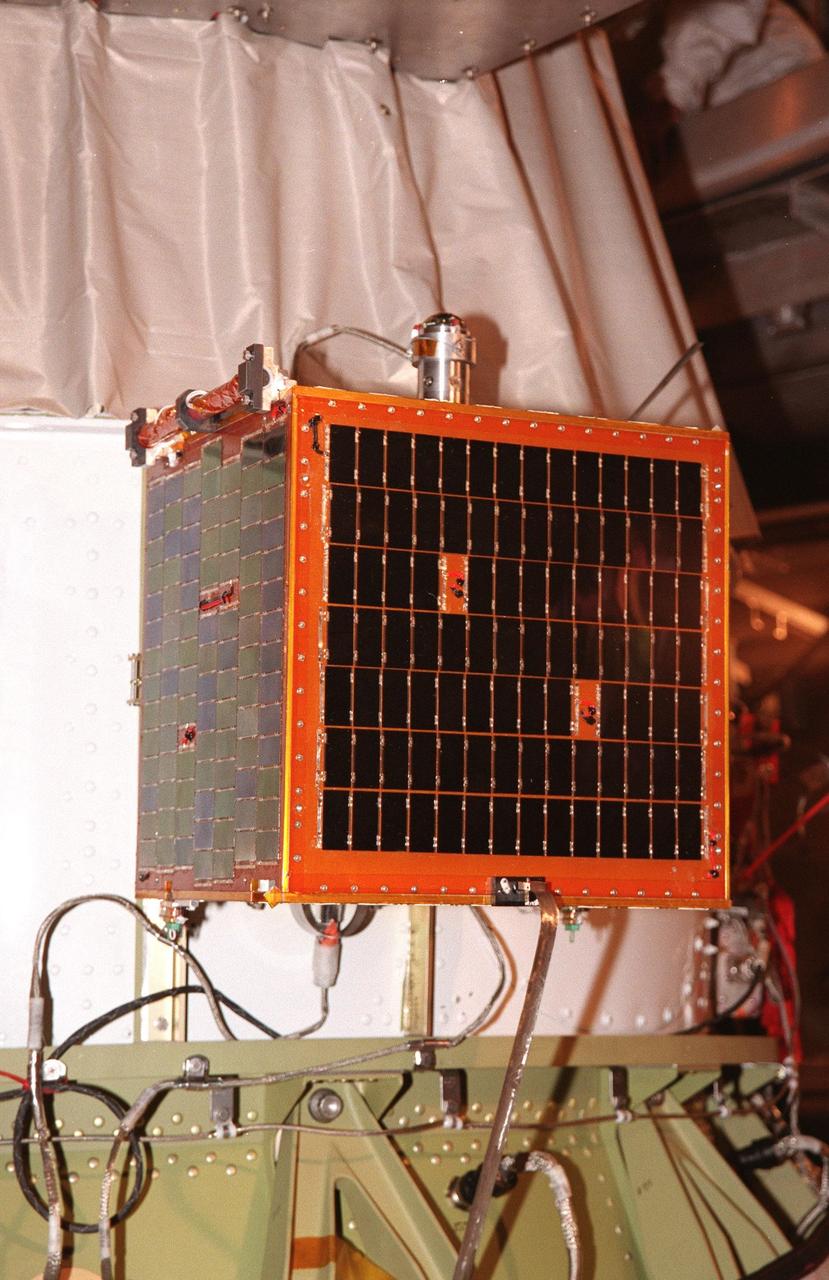 KENNEDY SPACE CENTER, FLA. -- Attached to the second stage of a Boeing Delta II at Pad 17A, Cape Canaveral Air Station, is the Students for the Exploration and Development of Space Satellite-1 (SEDSat-1). An international project, SEDSat-1 is a secondary payload on the Deep Space 1 mission and will be deployed 88 minutes after launch over Hawaii. The satellite includes cameras for imaging Earth, a unique attitude determination system, and amateur radio communication capabilities. Deep Space 1, targeted for launch on Oct. 24, is the first flight in NASA's New Millennium Program and is designed to validate 12 new technologies for scientific space missions of the next century