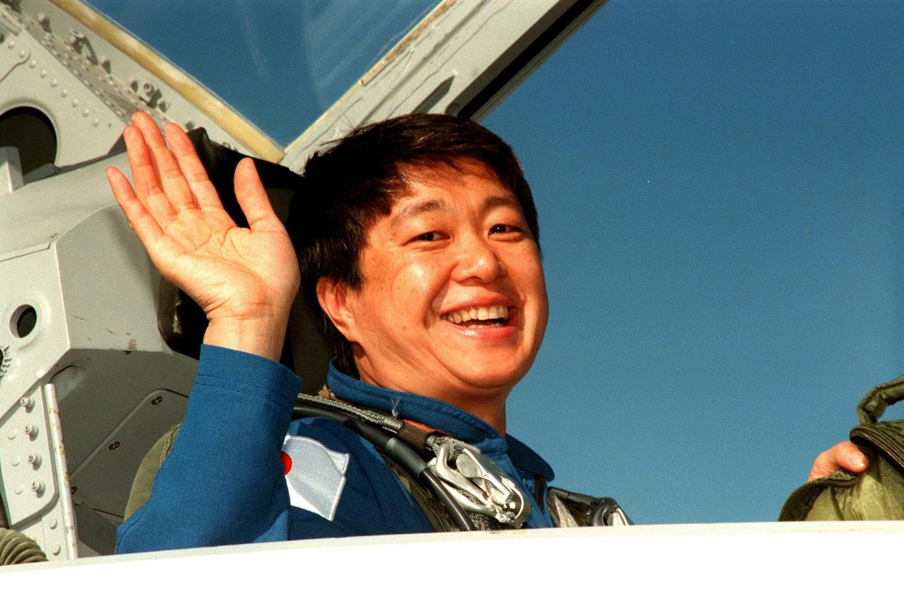 STS-95 Payload Specialist Chiaki Mukai, with the National Space Development Agency of Japan (NASDA), waves on her arrival at Kennedy Space Center's Shuttle Landing Facility aboard a T-38 jet. She and other crewmembers will be making final preparations for launch, targeted for liftoff at 2 p.m. on Oct. 29. The STS-95 mission includes research payloads such as the Spartan solar-observing deployable spacecraft, the Hubble Space Telescope Orbital Systems Test Platform, the International Extreme Ultraviolet Hitchhiker, as well as the SPACEHAB single module with experiments on space flight and the aging process. The mission is expected to last 8 days, 21 hours and 49 minutes, and return to KSC on Nov. 7. The other STS-95 crewmembers are Mission Commander Curtis L. Brown Jr., Pilot Steven W. Lindsey, Mission Specialist Scott E. Parazynski, Mission Specialist Stephen K. Robinson, Payload Specialist John H. Glenn Jr., senator from Ohio, and Mission Specialist Pedro Duque, with the European Space Agency (ESA)