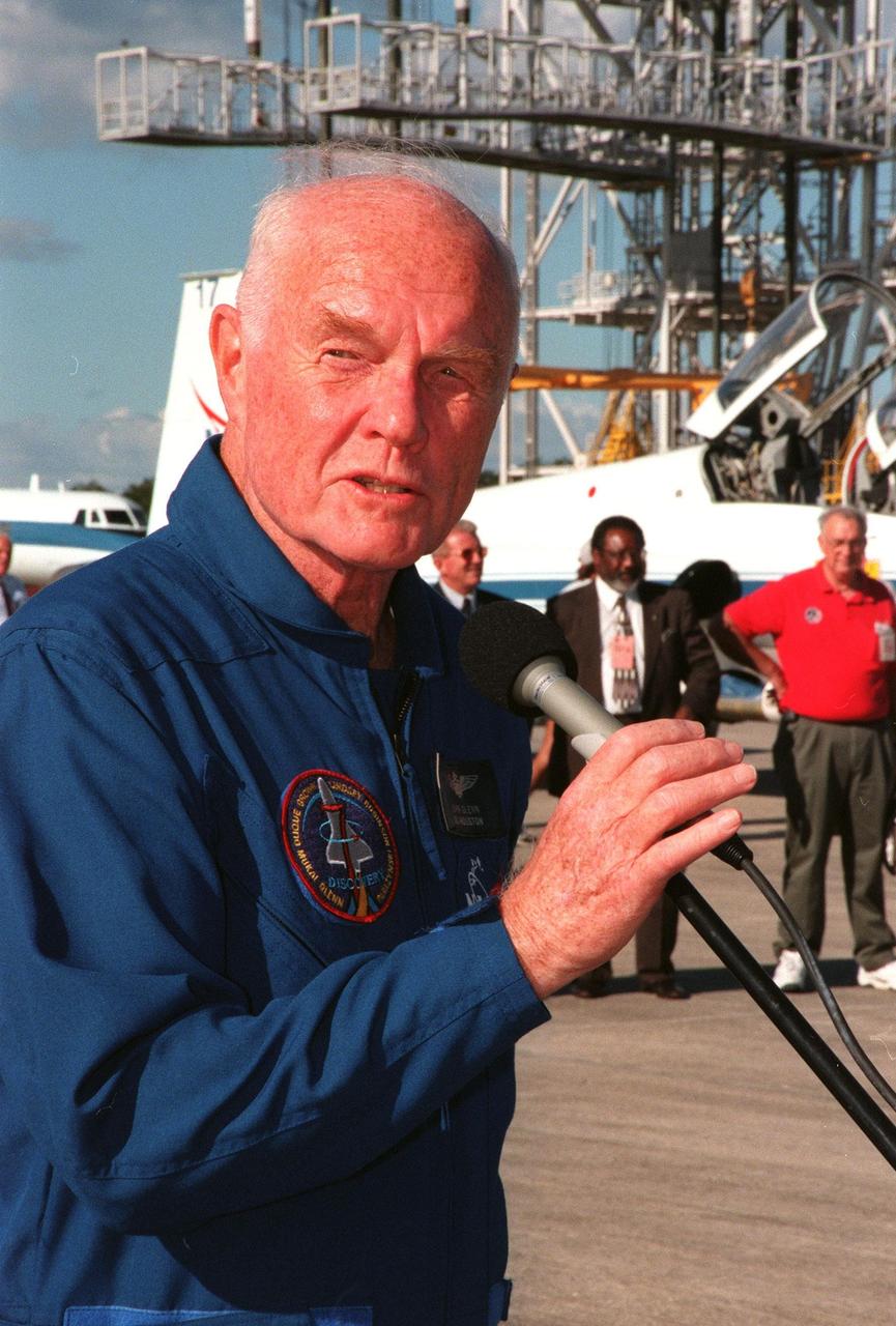 STS-95 Payload Specialist John H. Glenn Jr., senator from Ohio, talks to the media after the crew's arrival at the Shuttle Landing Facility to make final preparations for their launch. Targeted for liftoff at 2 p.m. on Oct. 29, the STS-95 mission includes research payloads such as the Spartan solar-observing deployable spacecraft, the Hubble Space Telescope Orbital Systems Test Platform, the International Extreme Ultraviolet Hitchhiker, as well as the SPACEHAB single module with experiments on space flight and the aging process. The mission is expected to last 8 days, 21 hours and 49 minutes, and return to KSC on Nov. 7