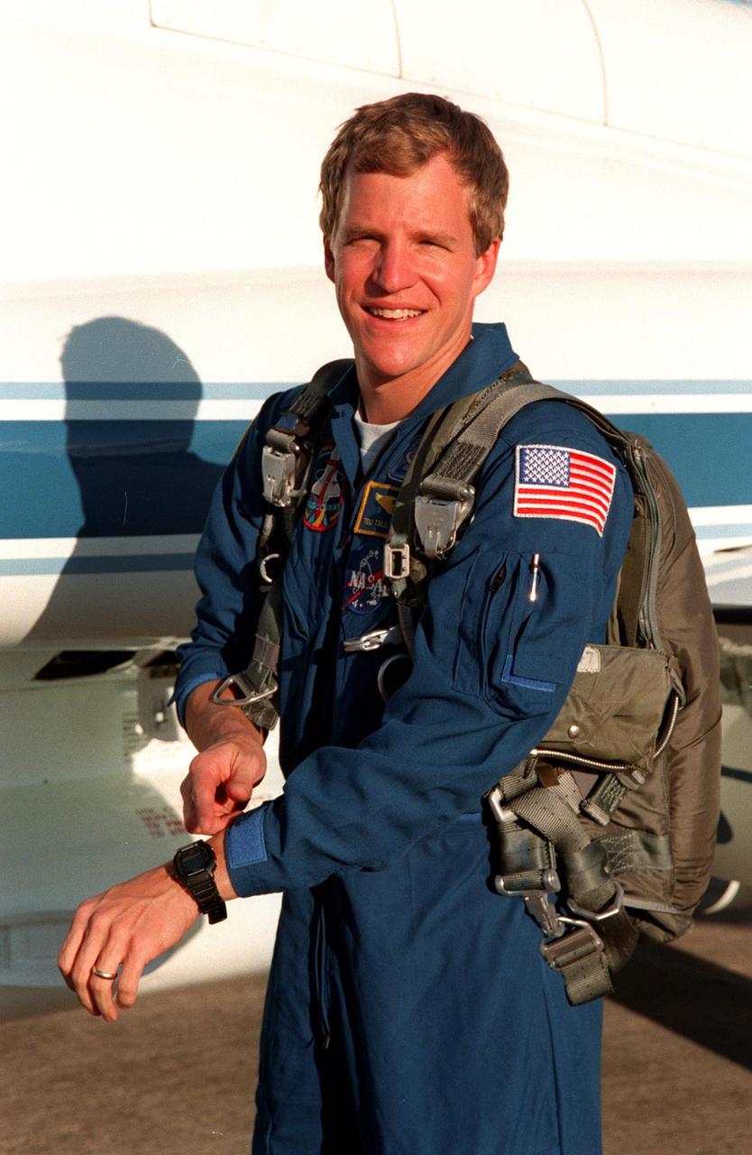 STS-95 Mission Specialist Scott E. Parazynski notes the time on his watch upon his late arrival aboard a T-38 jet at the Shuttle Landing Facility. Parazynski's first plane experienced problems at the stop at Tyndall AFB and he had to wait for another jet and pilot to finish the flight to KSC. He joined other crewmembers Mission Commander Curtis L. Brown Jr., Pilot Steven W. Lindsey, Mission Specialist Stephen K. Robinson, Payload Specialist John H. Glenn Jr., senator from Ohio, Mission Specialist Pedro Duque, with the European Space Agency (ESA), and Payload Specialist Chiaki Mukai, with the National Space Development Agency of Japan (NASDA), for final pre-launch preparations. STS-95 is expected to launch at 2 p.m. EST on Oct. 29, last 8 days, 21 hours and 49 minutes, and land at 11:49 a.m. EST on Nov. 7