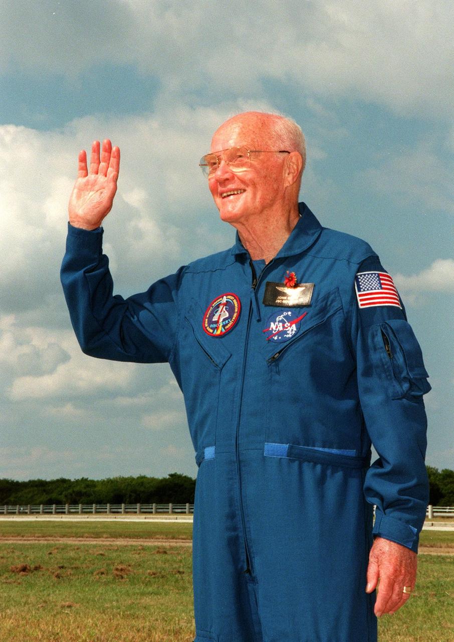 STS-95 Payload Specialist Payload Specialist John H. Glenn Jr., senator from Ohio, waves at family and well-wishers while at Launch Pad 39B. The crew were making final preparations for launch, targeted for liftoff at 2 p.m. on Oct. 29. Other crew members not shown are Mission Commander Curtis L. Brown Jr., Pilot Steven W. Lindsey, Mission Specialist Pedro Duque of Spain, with the European Space Agency (ESA), Mission Specialist Scott E. Parazynski, Mission Specialist Stephen K. Robinson, and Chiaki Mukai, with the National Space Development Agency of Japan (NASDA). The STS-95 mission is expected to last 8 days, 21 hours and 49 minutes, returning to KSC at 11:49 a.m. EST on Nov. 7