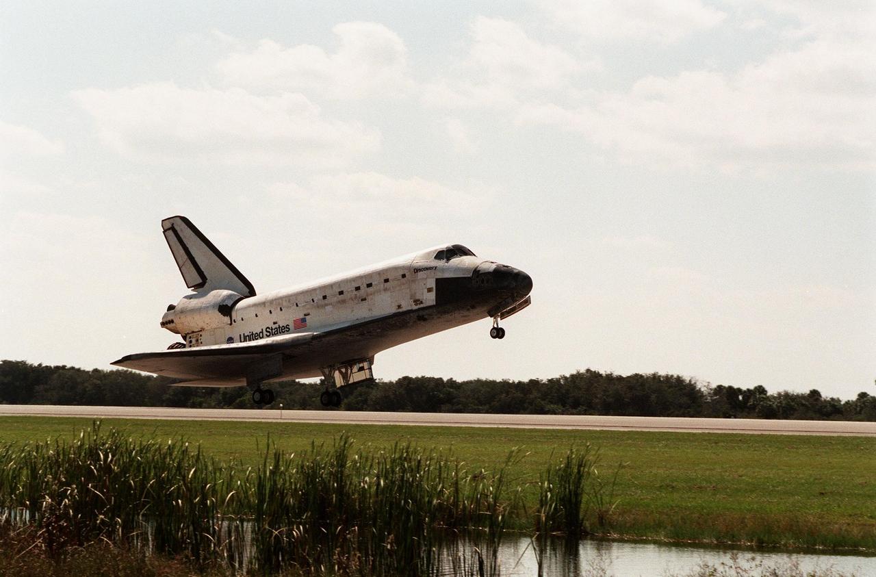 Orbiter Discovery touches down on runway 33 at the Shuttle Landing Facility after a successful mission of nearly nine days and 3.6 million miles. Main gear touchdown was at 12:04 p.m. EST, landing on orbit 135. The STS-95 crew consists of Mission Commander Curtis L. Brown Jr.; Pilot Steven W. Lindsey; Mission Specialist Scott E. Parazynski; Mission Specialist Stephen K. Robinson; Payload Specialist John H. Glenn Jr., a senator from Ohio; Mission Specialist Pedro Duque, with the European Space Agency (ESA); and Payload Specialist Chiaki Mukai, M.D., with the National Space Development Agency of Japan (NASDA). The mission included research payloads such as the Spartan solar-observing deployable spacecraft, the Hubble Space Telescope Orbital Systems Test Platform, the International Extreme Ultraviolet Hitchhiker, as well as the SPACEHAB single module with experiments on space flight and the aging process