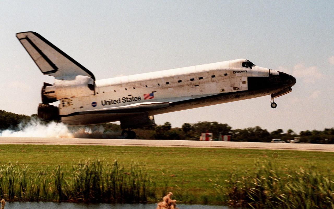 Orbiter Discovery smokes its tires as it touches down on runway 33 at the Shuttle Landing Facility. Main gear touchdown was at 12:04 p.m. EST, landing on orbit 135. Discovery returns to Earth with its crew of seven after successfully completing mission STS-95, lasting nearly nine days and 3.6 million miles. The crew consists of Mission Commander Curtis L. Brown Jr.; Pilot Steven W. Lindsey; Mission Specialist Scott E. Parazynski; Mission Specialist Stephen K. Robinson; Payload Specialist John H. Glenn Jr., senator from Ohio; Mission Specialist Pedro Duque of Spain, with the European Space Agency (ESA); and Payload Specialist Chiaki Mukai,M.D., with the National Space Development Agency of Japan (NASDA). The mission included research payloads such as the Spartan solar-observing deployable spacecraft, the Hubble Space Telescope Orbital Systems Test Platform, the International Extreme Ultraviolet Hitchhiker, as well as the SPACEHAB single module with experiments on space flight and the aging process
