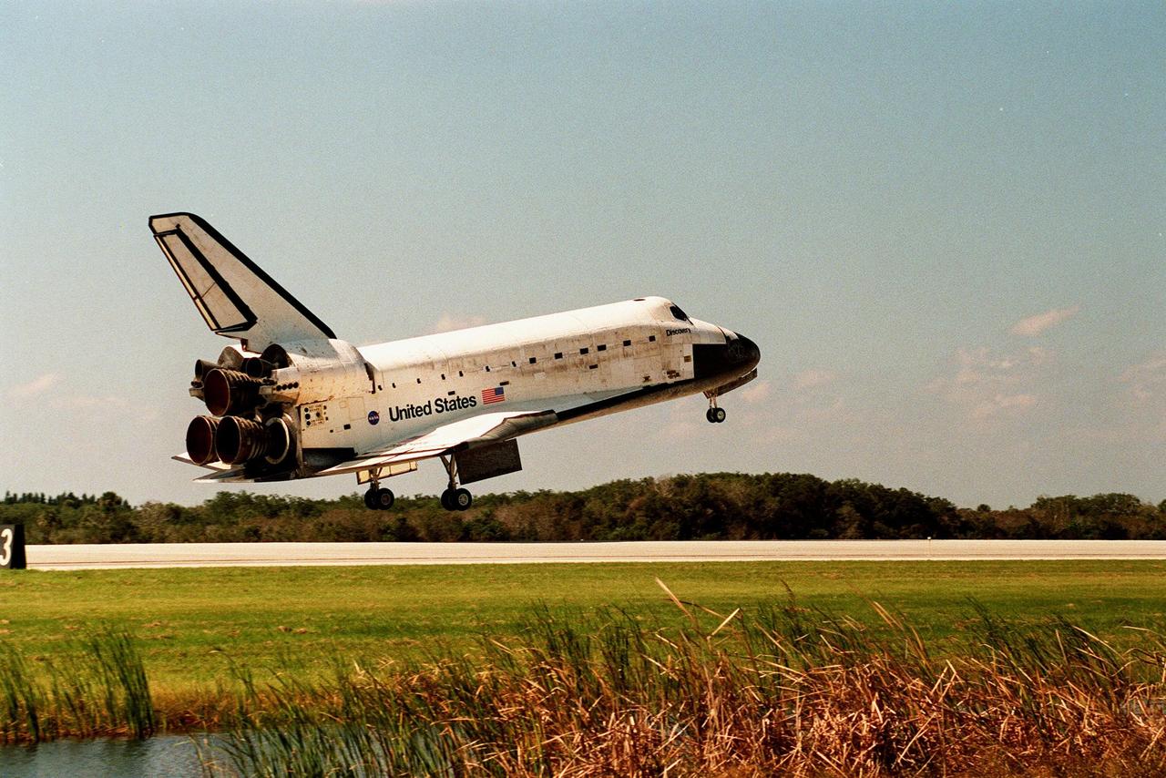 Orbiter Discovery prepares to land on runway 33 at the Shuttle Landing Facility. Main gear touchdown was at 12:04 p.m. EST, landing on orbit 135. Discovery returns to Earth with its crew of seven after successfully completing mission STS-95, lasting nearly nine days and 3.6 million miles. The crew members are Mission Commander Curtis L. Brown Jr.; Pilot Steven W. Lindsey; Mission Specialist Scott E. Parazynski; Mission Specialist Stephen K. Robinson; Payload Specialist John H. Glenn Jr., a senator from Ohio; Mission Specialist Pedro Duque of Spain, with the European Space Agency (ESA); and Payload Specialist Chiaki Mukai, M.D., with the National Space Development Agency of Japan (NASDA). The mission included research payloads such as the Spartan solar-observing deployable spacecraft, the Hubble Space Telescope Orbital Systems Test Platform, the International Extreme Ultraviolet Hitchhiker, as well as the SPACEHAB single module with experiments on space flight and the aging process