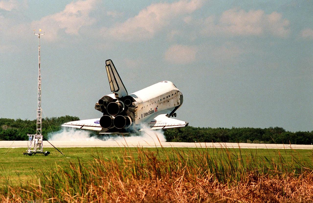 Orbiter Discovery touches down in a cloud of smoke on runway 33 at the Shuttle Landing Facility. Main gear touchdown was at 12:04 p.m. EST, landing on orbit 135. Discovery returns to Earth with its crew of seven after successfully completing mission STS-95, lasting nearly nine days and 3.6 million miles. The crew members are Mission Commander Curtis L. Brown Jr.; Pilot Steven W. Lindsey; Mission Specialist Scott E. Parazynski; Mission Specialist Stephen K. Robinson; Payload Specialist John H. Glenn Jr., a senator from Ohio; Mission Specialist Pedro Duque of Spain, with the European Space Agency (ESA); and Payload Specialist Chiaki Mukai, M.D., with the National Space Development Agency of Japan (NASDA). The mission included research payloads such as the Spartan solar-observing deployable spacecraft, the Hubble Space Telescope Orbital Systems Test Platform, the International Extreme Ultraviolet Hitchhiker, as well as the SPACEHAB single module with experiments on space flight and the aging process