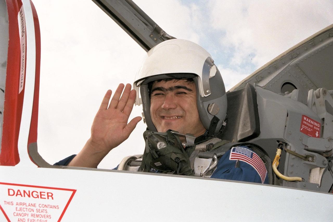 STS-89 Mission Specialist Salizhan Sharipov of the Russian Space Agency arrives at the KSC Shuttle Landing Facility in one of the T-38 aircraft traditionally flown by the astronaut corps. The eight STS-89 crew members flew into KSC from Johnson Space Center as final preparations are under way toward the scheduled liftoff on Jan. 22 of the Space Shuttle Endeavour on the eighth mission to dock with the Russian Space Station Mir. After docking, STS-89 Mission Specialist Andrew Thomas, Ph.D., will transfer to the space station, succeeding David Wolf, M.D., who will return to Earth aboard Endeavour. Dr. Thomas will live and work on Mir until June. STS-89 is scheduled for a Jan. 22 liftoff at 9:48 p.m. EST