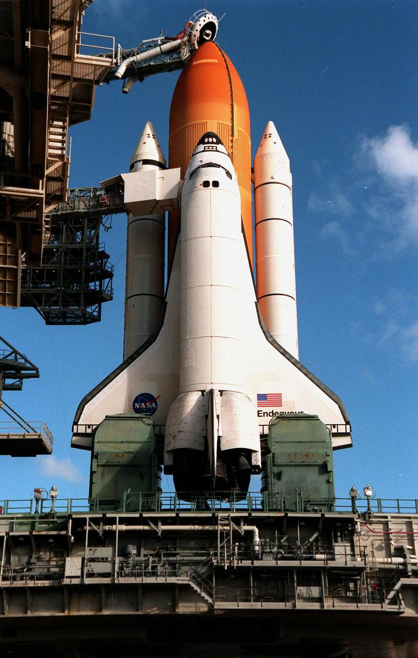 KENNEDY SPACE CENTER, FLA. -- With the Rotating Service Structure on Launch Pad 39A rolled back, the Space Shuttle Endeavour on top of the Mobile Launcher Platform is poised for launch on mission STS-88. Lift-off is targeted for 3:56 a.m. on Dec. 3. The first U.S. launch for the International Space Station, STS-88 is expected to last 11 days, 19 hours and 49 minutes, and land at 10:17 p.m. EST on Dec. 14. Endeavour carries the Unity connecting module which the crew will be mating with the Russian-built Zarya control module already in orbit. In addition to Unity, two small replacement electronics boxes are on board for possible repairs to Zarya batteries