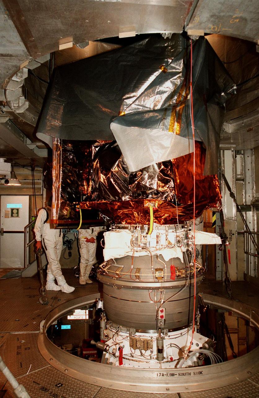 KENNEDY SPACE CENTER, FLA. -- At Launch Complex 17A, Cape Canaveral Air Station, the Mars Climate Orbiter is free of the protective canister that surrounded it during the move to the pad. Targeted for liftoff on Dec. 10, 1998, aboard a Boeing Delta II (7425) rocket, the orbiter will be the first spacecraft to be launched in the pair of Mars '98 missions. After its arrival at the red planet, the Mars Climate Orbiter will be used primarily to support its companion Mars Polar Lander spacecraft, scheduled for launch on Jan. 3, 1999. The orbiter will then monitor the Martian atmosphere and image the planet's surface on a daily basis for one Martian year, the equivalent of about two Earth years. The spacecraft will observe the appearance and movement of atmospheric dust and water vapor, and characterize seasonal changes on the planet's surface