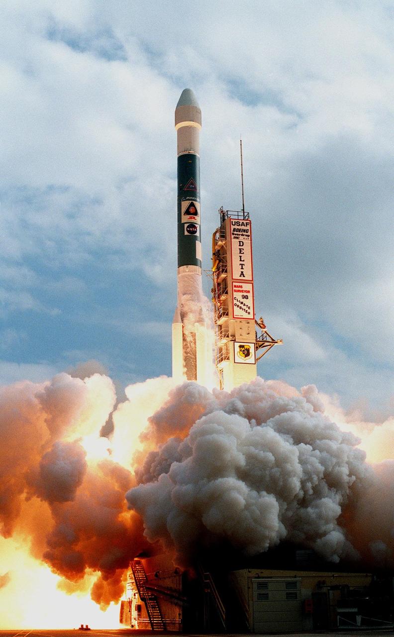 KENNEDY SPACE CENTER, FLA. -- A Boeing Delta II expendable launch vehicle lifts off with NASA's Mars Climate Orbiter at 1:45:51 p.m. EST, on Dec. 11, 1998, from Launch Complex 17A, Cape Canaveral Air Station. The launch was delayed one day when personnel detected a battery-related software problem in the spacecraft. The problem was corrected and the launch was rescheduled for the next day. The first of a pair of spacecraft to be launched in the Mars Surveyor '98 Project, the orbiter is heading for Mars where it will first provide support to its companion Mars Polar Lander spacecraft, which is planned for launch on Jan. 3, 1999. The orbiter's instruments will then monitor the Martian atmosphere and image the planet's surface on a daily basis for one Martian year (1.8 Earth years). It will observe the appearance and movement of atmospheric dust and water vapor, as well as characterize seasonal changes on the surface. The detailed images of the surface features will provide important clues to the planet's early climate history and give scientists more information about possible liquid water reserves beneath the surface