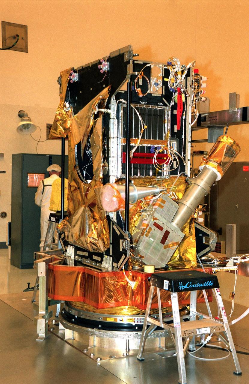 In the Payload Hazardous Servicing Facility, the Stardust spacecraft is ready for the sample return capsule to be attached. Stardust will use a unique medium called aerogel to capture comet particles flying off the nucleus of comet Wild 2 in January 2004, plus collect interstellar dust for later analysis. The collected samples will return to Earth in the re-entry capsule to be jettisoned as it swings by Earth in January 2006. Stardust is scheduled to be launched aboard a Boeing Delta 7426 rocket from Complex 17, Cape Canaveral Air Station, on Feb. 6, 1999