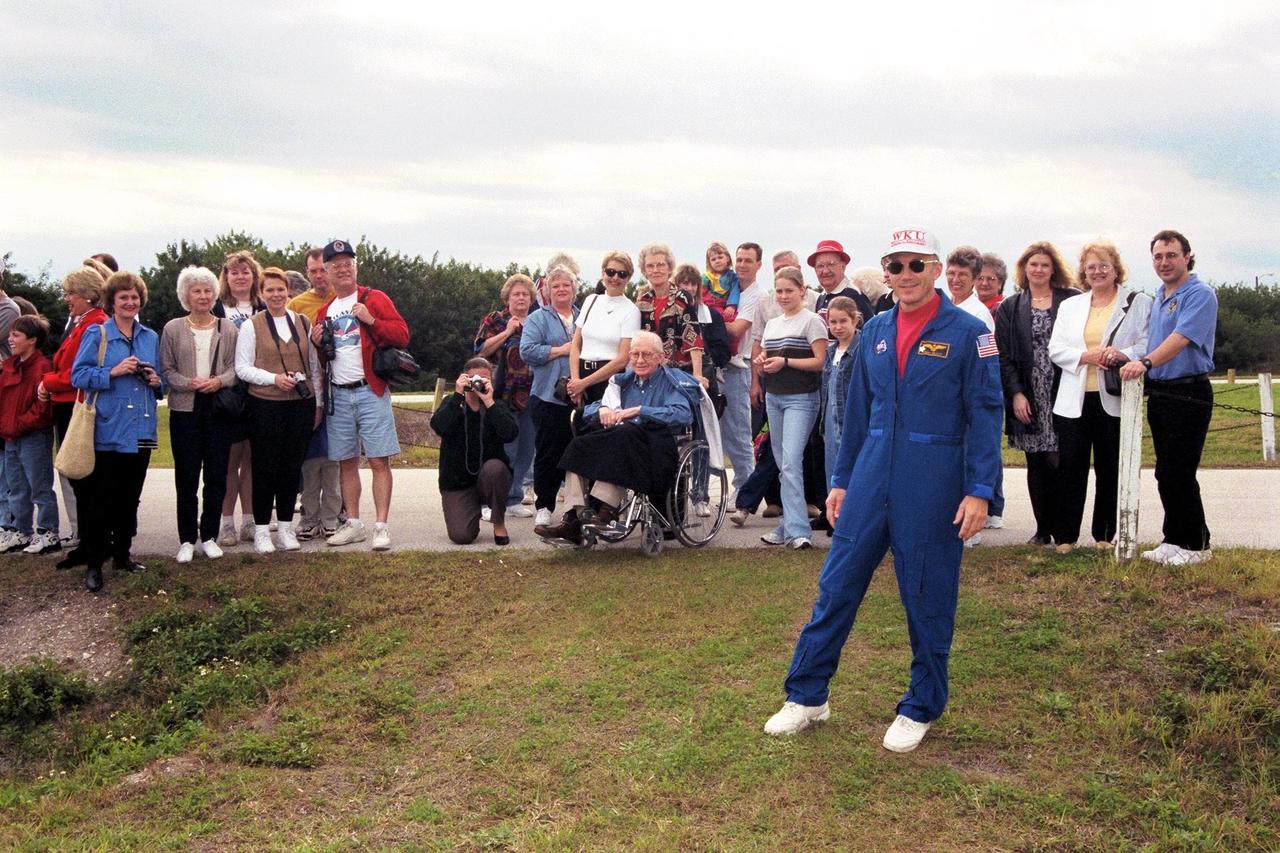KENNEDY SPACE CENTER, Fla. -- STS-89 Commander Terrence Wilcutt poses in front of the crew's family and friends at KSC's Launch Pad 39A the day before the scheduled launch of Space Shuttle Endeavour. Final preparations are under way toward liftoff on Jan. 22 on the eighth mission to dock with the Russian Space Station Mir. After docking, Mission Specialist Andrew Thomas, Ph.D., will transfer to the space station, succeeding David Wolf, M.D., who will return to Earth aboard Endeavour. Dr. Thomas will live and work on Mir until June. STS-89 is scheduled for liftoff at 9:48 p.m. EST