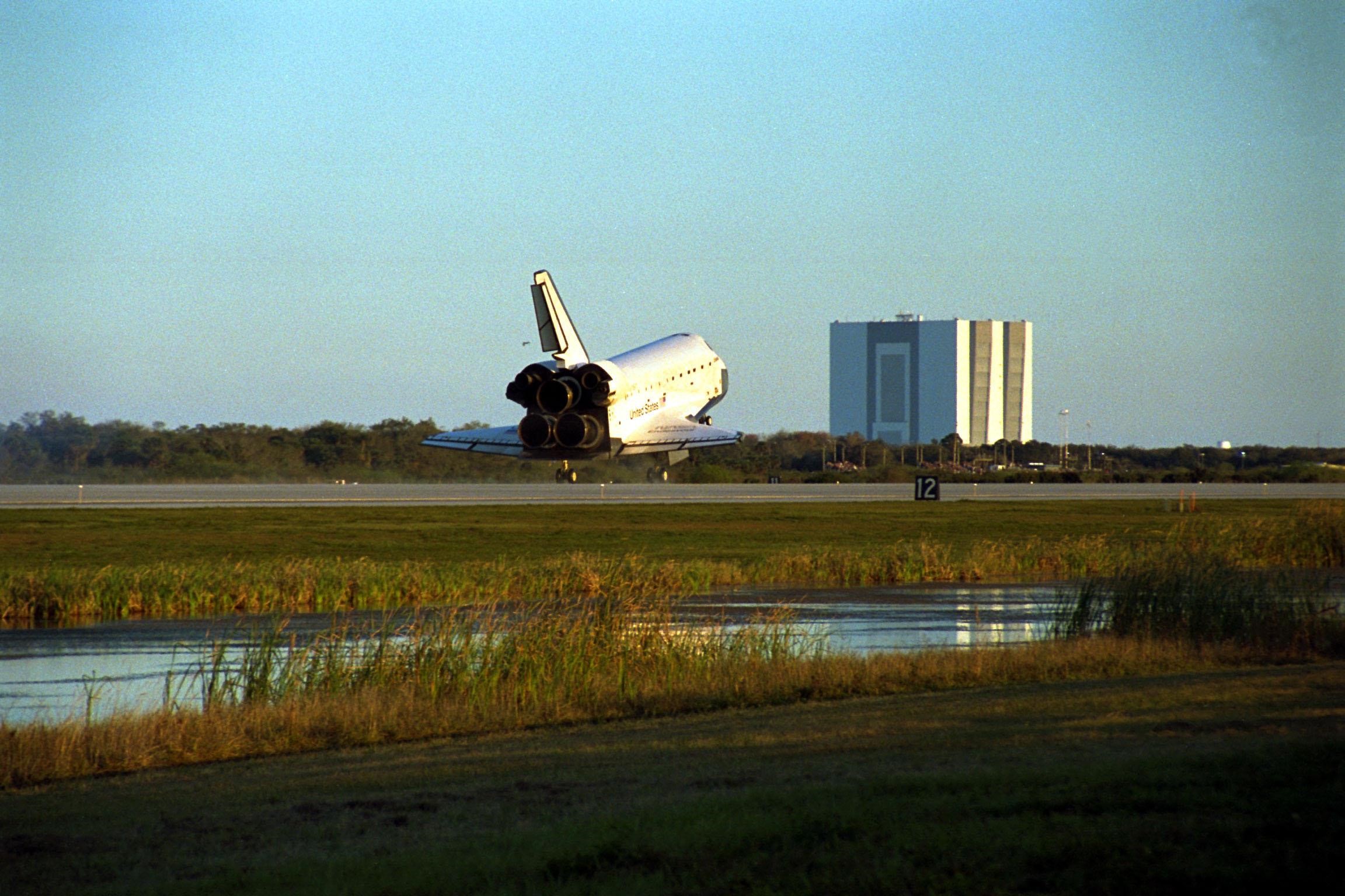KENNEDY SPACE CENTER, Fla. -- The Space Shuttle orbiter Endeavour touches down on Runway 15 of the KSC Shuttle Landing Facility (SLF) to complete the nearly nine-day STS-89 mission. Main gear touchdown was at 5:35:09 p.m. EST on Jan. 31, 1998. The wheels stopped at 5:36:19 EST, completing a total mission time of eight days, 19 hours, 48 minutes and four seconds. The 89th Space Shuttle mission was the 42nd (and 13th consecutive) landing of the orbiter at KSC, and STS-89 was the eighth of nine planned dockings of the Space Shuttle with the Russian Space Station Mir. STS-89 Mission Specialist Andrew Thomas, Ph.D., succeeded NASA astronaut and Mir 24 crew member David Wolf, M.D., who was on the Russian space station since late September 1997. Dr. Wolf returned to Earth on Endeavour with the remainder of the STS-89 crew, including Commander Terrence Wilcutt; Pilot Joe Edwards Jr.; and Mission Specialists James Reilly, Ph.D.; Michael Anderson; Bonnie Dunbar, Ph.D.; and Salizhan Sharipov with the Russian Space Agency. Dr. Thomas is scheduled to remain on Mir until the STS-91 Shuttle mission returns in June 1998. In addition to the docking and crew exchange, STS-89 included the transfer of science, logistical equipment and supplies between the two orbiting spacecrafts