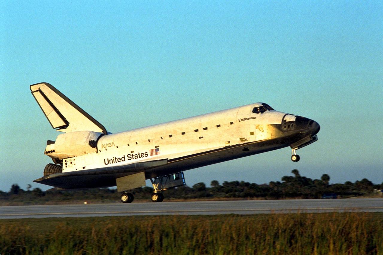 KENNEDY SPACE CENTER, Fla. -- The Space Shuttle orbiter Endeavour touches down on Runway 15 of the KSC Shuttle Landing Facility (SLF) to complete the nearly nine-day STS-89 mission. Main gear touchdown was at 5:35:09 p.m. EST on Jan. 31, 1998. The wheels stopped at 5:36:19 EST, completing a total mission time of eight days, 19 hours, 48 minutes and four seconds. The 89th Space Shuttle mission was the 42nd (and 13th consecutive) landing of the orbiter at KSC, and STS-89 was the eighth of nine planned dockings of the Space Shuttle with the Russian Space Station Mir. STS-89 Mission Specialist Andrew Thomas, Ph.D., succeeded NASA astronaut and Mir 24 crew member David Wolf, M.D., who was on the Russian space station since late September 1997. Dr. Wolf returned to Earth on Endeavour with the remainder of the STS-89 crew, including Commander Terrence Wilcutt; Pilot Joe Edwards Jr.; and Mission Specialists James Reilly, Ph.D.; Michael Anderson; Bonnie Dunbar, Ph.D.; and Salizhan Sharipov with the Russian Space Agency. Dr. Thomas is scheduled to remain on Mir until the STS-91 Shuttle mission returns in June 1998. In addition to the docking and crew exchange, STS-89 included the transfer of science, logistical equipment and supplies between the two orbiting spacecrafts