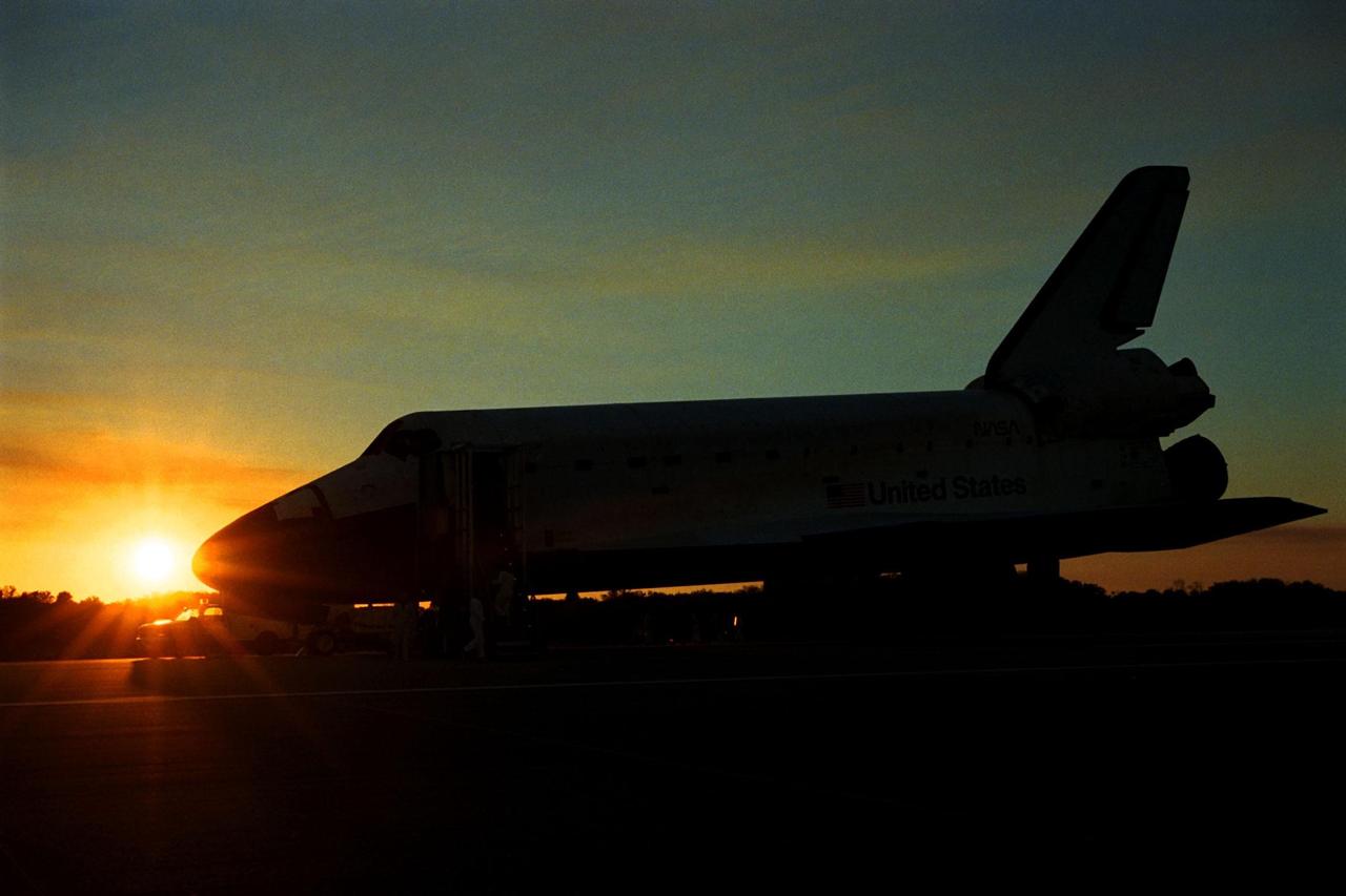 KENNEDY SPACE CENTER, FLA. -- The orbiter Endeavour closes the day peacefully on KSC's Shuttle Landing Facility Runway 15, completing the nearly nine-day STS-89 mission. Main gear touchdown was at 5:35:09 p.m. EST on Jan. 31, 1998. The wheels stopped at 5:36:19 EST, completing a total mission time of eight days, 19 hours, 48 minutes and four seconds. The 89th Space Shuttle mission was the 42nd (and 13th consecutive) landing of the orbiter at KSC, and STS-89 was the eighth of nine planned dockings of the Space Shuttle with the Russian Space Station Mir. STS-89 Mission Specialist Andrew Thomas, Ph.D., succeeded NASA astronaut and Mir 24 crew member David Wolf, M.D., who was on the Russian space station since late September 1997. Dr. Wolf returned to Earth on Endeavour with the remainder of the STS-89 crew, including Commander Terrence Wilcutt; Pilot Joe Edwards Jr.; and Mission Specialists James Reilly, Ph.D.; Michael Anderson; Bonnie Dunbar, Ph.D.; and Salizhan Sharipov with the Russian Space Agency. Dr. Thomas is scheduled to remain on Mir until the STS-91 Shuttle mission returns in June 1998. In addition to the docking and crew exchange, STS-89 included the transfer of science, logistical equipment and supplies between the two orbiting spacecrafts
