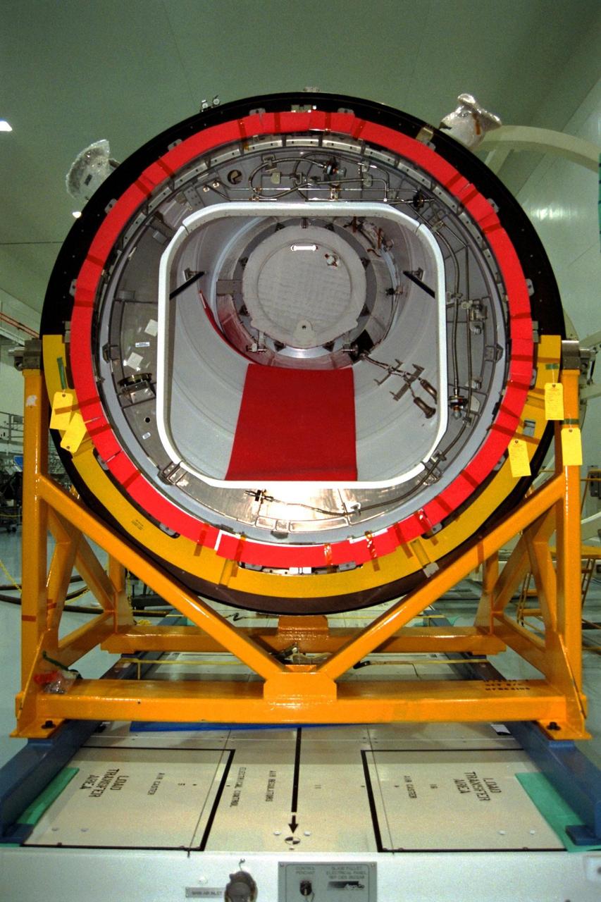 KENNEDY SPACE CENTER, FLA. -- The Pressurized Mating Adapter (PMA)-2 for the International Space Station (ISS) awaits being mated with Node 1, the space station’s structural building block, in KSC’s Space Station Processing Facility. This PMA, identifiable by its bright red ring, is a cone-shaped connector to Node 1, which will have two PMAs attached once this mate is completed. The node and PMAs, which together will make up the first element of the ISS, are scheduled to be launched aboard the Space Shuttle Endeavour on STS-88