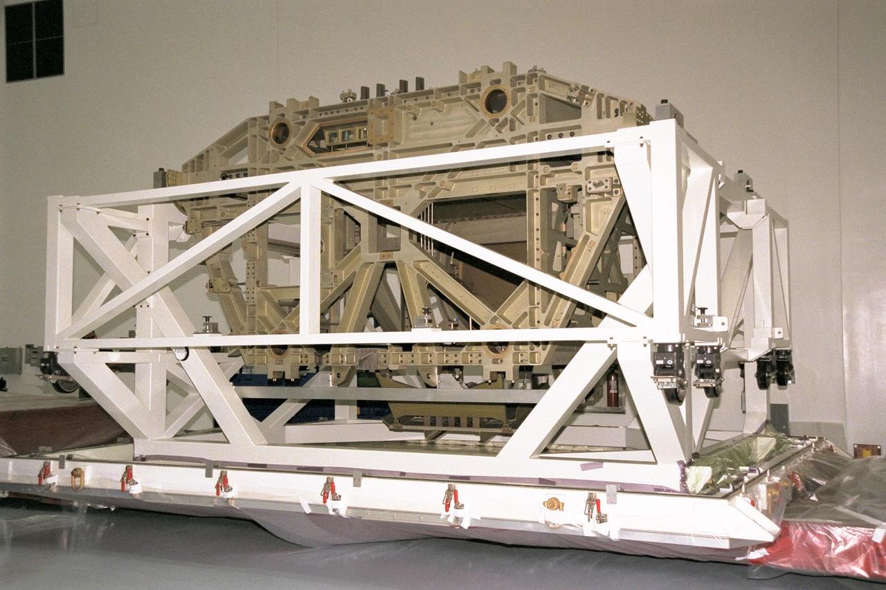 The Z1 Integrated Truss Segment (ITS), a major element of the STS-92 mission scheduled for launch aboard Space Shuttle Atlantis in January 1999, awaits processing in KSC's Space Station Processing Facility (SSPF). The Z-1 truss supports the staged buildup of International Space Station (ISS) on this third scheduled flight for ISS. The Z1 truss allows the temporary installation of the U.S. power module to Node 1. Early in the assembly sequence, the purpose of Z1 is to provide a mounting location for Ku-band and S-band telemetry and extravehicular activity (EVA) equipment. It also provides common berthing mechanism hardcover stowage. In addition, it will assist with the execution of nonpropulsive attitude control. The truss arrived at KSC on Feb. 17 for preflight processing in the SSPF