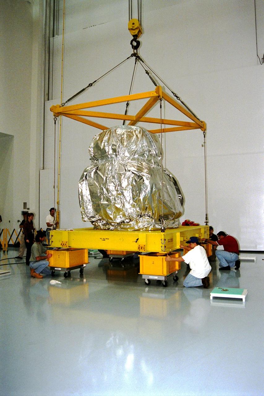 KENNEDY SPACE CENTER, FLA. -- The Pressurized Mating Adapter-3 (PMA-3), an element of the STS-92 mission scheduled for launch aboard Space Shuttle Atlantis in January 1999, arrived from the Boeing Company in Huntington Beach, Calif., for processing in KSC's Space Station Processing Facility (SSPF). While in orbit, PMA-3 will be removed from the orbiter's payload bay by the astronauts using the remote manipulator arm and mated to Node 1, a connecting passageway to the living and working areas of the International Space Station. The primary purpose of PMA-3 is to serve as a Shuttle docking port through which crew members and equipment will transfer to the International Space Station during later assembly missions