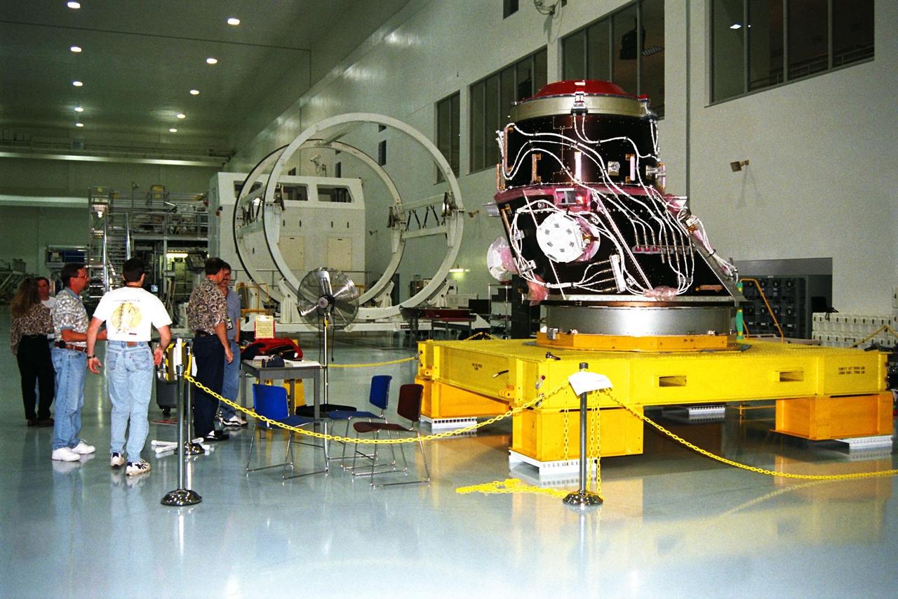 KENNEDY SPACE CENTER, FLA. -- Seen at the right of the photograph, the Pressurized Mating Adapter-3 (PMA-3), an element of the STS-92 mission scheduled for launch aboard Space Shuttle Atlantis in January 1999, awaits processing in KSC's Space Station Processing Facility (SSPF). While in orbit, PMA-3 will be removed from the orbiter's payload bay by the astronauts using the remote manipulator arm and mated to Node 1, a connecting passageway to the living and working areas of the International Space Station. The primary purpose of PMA-3 is to serve as a Shuttle docking port through which crew members and equipment will transfer to the International Space Station during later assembly missions