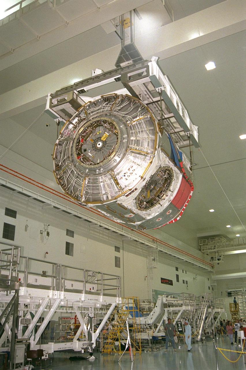 Node 1, the first U.S. element for the International Space Station, and Pressurized Mating Adapter-1 (PMA-1) continue with prelaunch preparation activities at KSC's Space Station Processing Facility. Node 1 is a connecting passageway to the living and working areas of the space station. The node and PMA-1 are being moved to an element rotation stand, or test stand, where they will undergo an interim weight and center of gravity determination. The final determination is planned to be performed prior to transporting Node 1 to the launch pad. Node 1 is scheduled to fly on STS-88