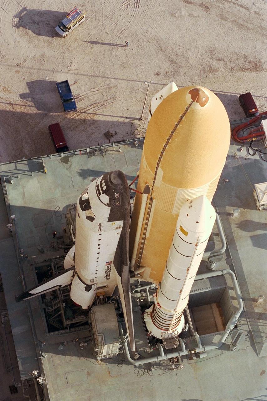 KENNEDY SPACE CENTER, FLA. -- The Space Shuttle Columbia continues its rollout from the Vehicle Assembly Building to Launch Pad 39B in preparation for the STS-90 mission. The Neurolab experiments are the primary payload on this nearly 17-day space flight. Investigations during the Neurolab mission will focus on the effects of microgravity on the nervous system. Specifically, experiments will study the adaptation of the vestibular system, the central nervous system, and the pathways that control the ability to sense location in the absence of gravity, as well as the effect of microgravity on a developing nervous system. The crew of STS-90, slated for launch April 16 at 2:19 p.m. EDT, includes Commander Richard Searfoss, Pilot Scott Altman, Mission Specialists Richard Linnehan, Dafydd (Dave) Williams, M.D., and Kathryn (Kay) Hire, and Payload Specialists Jay Buckey, M.D., and James Pawelczyk, Ph.D