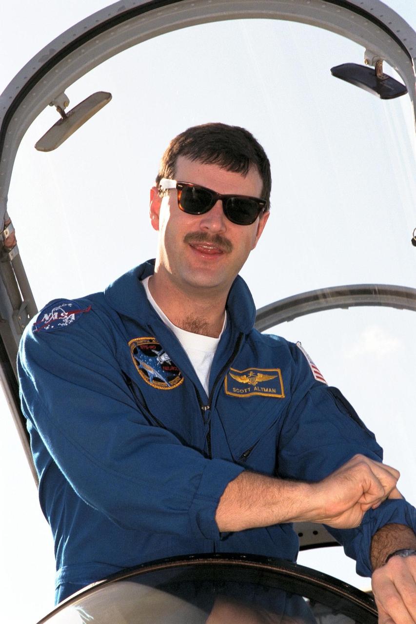 STS-90 Pilot Scott Altman poses in the cockpit of his T-38 jet trainer aircraft after arriving at the KSC Shuttle Landing Facility along with other members of the crew from NASA’s Johnson Space Center to begin Terminal Countdown Demonstration Test (TCDT) activities. The TCDT is held at KSC prior to each Space Shuttle flight to provide crews with the opportunity to participate in simulated countdown activities. Columbia is targeted for launch of STS-90 on April 16 at 2:19 p.m. EDT and will be the second mission of 1998. The mission is scheduled to last nearly 17 days