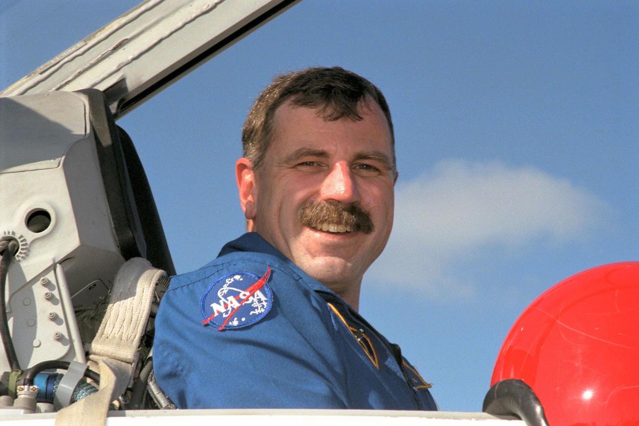 STS-90 Mission Specialist Dafydd (Dave) Williams with the Canadian Space Agency poses in the cockpit of his T-38 jet trainer aircraft after arriving at the KSC Shuttle Landing Facility along with other members of the crew from NASA’s Johnson Space Center to begin Terminal Countdown Demonstration Test (TCDT) activities. The TCDT is held at KSC prior to each Space Shuttle flight to provide crews with the opportunity to participate in simulated countdown activities. Columbia is targeted for launch of STS-90 on April 16 at 2:19 p.m. EDT and will be the second mission of 1998. The mission is scheduled to last nearly 17 days