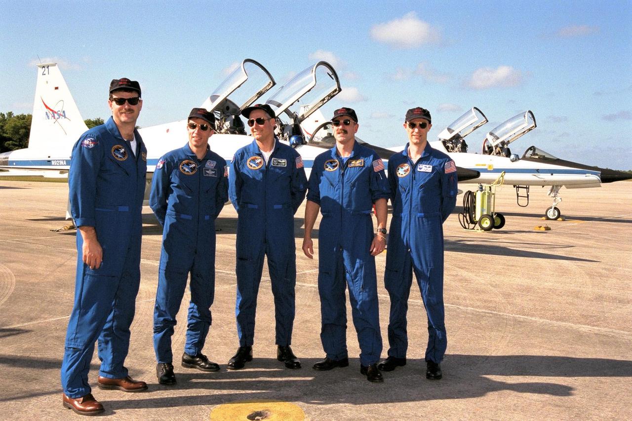 Members of the STS-90 crew pose together shortly after arriving at the KSC Shuttle Landing Facility from NASA’s Johnson Space Center to begin Terminal Countdown Demonstration Test (TCDT) activities. The TCDT is held at KSC prior to each Space Shuttle flight to provide crews with the opportunity to participate in simulated countdown activities. These five members of the seven-member crew are, left to right, Pilot Scott Altman, Commander Richard Searfoss, Payload Specialist Jay Buckey, M.D., Mission Specialist Daffyd (Dave) Williams with the Canadian Space Agency, and Payload Specialist James Pawelczyk, Ph.D. Columbia is targeted for launch of STS-90 on April 16 at 2:19 p.m. EDT and will be the second mission of 1998. The mission is scheduled to last nearly 17 days