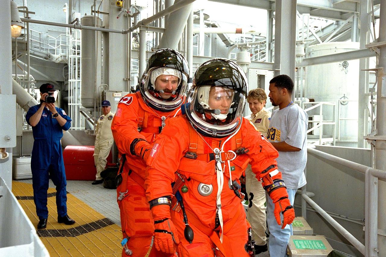 STS-90 Mission Specialists Dafydd (Dave) Williams with the Canadian Space Agency and Kathryn (Kay) Hire participate in Terminal Countdown Demonstration Test (TCDT) activities at KSC's Launch Pad 39B. The TCDT is held at KSC prior to each Space Shuttle flight to provide crews with the opportunity to participate in simulated countdown activities. The Space Shuttle Columbia is targeted for launch of STS-90 on April 16 at 2:19 p.m. EDT and will be the second mission of 1998. The mission is scheduled to last nearly 17 days