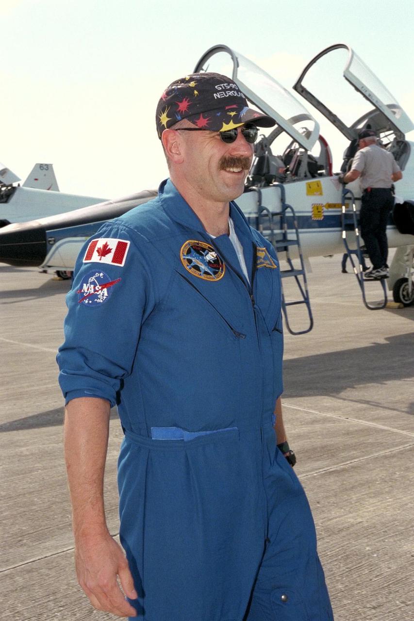 KENNEDY SPACE CENTER, FLA. -- STS-90 Mission Specialist Dafydd (Dave) Williams with the Canadian Space Agency smiles at the media shortly after his arrival at Kennedy Space Center's Shuttle Landing Facility. The crew arrived to prepare for the launch of Columbia, scheduled for April 16 at 2:19 p.m. EDT from KSC's Launch Pad 39B. The launch of Neurolab on STS-90, which will be the second mission of 1998, is scheduled to last nearly 17 days