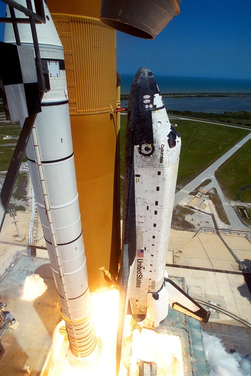 KENNEDY SPACE CENTER, FLA. -- The Space Shuttle Columbia lifts off from Launch Pad 39B at 2:19 p.m. EDT Apr. 17 to begin the nearly 17-day STS-90 Neurolab mission. A torrent of water is seen flowing onto the mobile launcher platform as several large quench nozzles, or "rainbirds," mounted on platform's surface operate as a sound suppression system. The crew members are Commander Richard Searfoss, Pilot Scott Altman, Mission Specialists Richard Linnehan, D.V.M., Dafydd (Dave) Williams, M.D., with the Canadian Space Agency, and Kathryn (Kay) Hire; and Payload Specialists Jay Buckey, M.D., and James Pawelczyk, Ph.D. Investigations during the Neurolab mission will focus on the effects of microgravity on the nervous system