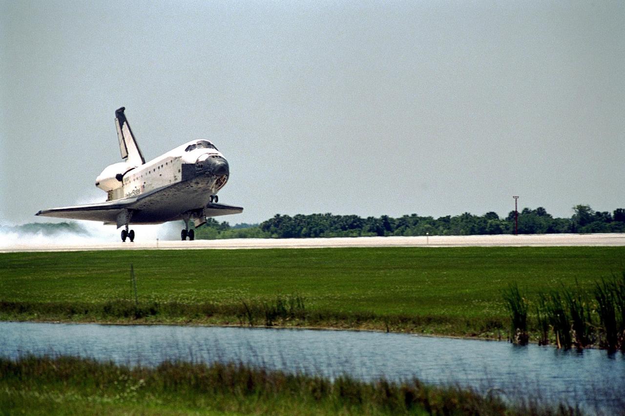 The orbiter Columbia touches down on Runway 33 of KSC's Shuttle Landing Facility to complete the nearly 16-day STS-90 mission. Main gear touchdown was at 12:08:59 p.m. EDT on May 3, 1998, landing on orbit 256 of the mission. The wheels stopped at 12:09:58 EDT, completing a total mission time of 15 days, 21 hours, 50 minutes and 58 seconds. The 90th Shuttle mission was Columbia's 13th landing at the space center and the 43rd KSC landing in the history of the Space Shuttle program. During the mission, the crew conducted research to contribute to a better understanding of the human nervous system. The crew of the STS-90 Neurolab mission include Commander Richard Searfoss; Pilot Scott Altman; Mission Specialists Richard Linnehan, D.V.M., Dafydd (Dave) Williams, M.D., with the Canadian Space Agency, and Kathryn (Kay) Hire; and Payload Specialists Jay Buckey, M.D., and James Pawelczyk, Ph.D