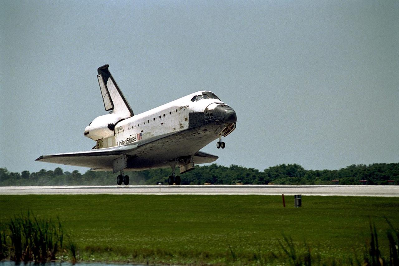 The orbiter Columbia approaches touchdown on Runway 33 of KSC's Shuttle Landing Facility to complete the nearly 16-day STS-90 mission. Main gear touchdown was at 12:08:59 p.m. EDT on May 3, 1998, landing on orbit 256 of the mission. The wheels stopped at 12:09:58 EDT, completing a total mission time of 15 days, 21 hours, 50 minutes and 58 seconds. The 90th Shuttle mission was Columbia's 13th landing at the space center and the 43rd KSC landing in the history of the Space Shuttle program. During the mission, the crew conducted research to contribute to a better understanding of the human nervous system. The crew of the STS-90 Neurolab mission include Commander Richard Searfoss; Pilot Scott Altman; Mission Specialists Richard Linnehan, D.V.M., Dafydd (Dave) Williams, M.D., with the Canadian Space Agency, and Kathryn (Kay) Hire; and Payload Specialists Jay Buckey, M.D., and James Pawelczyk, Ph.D