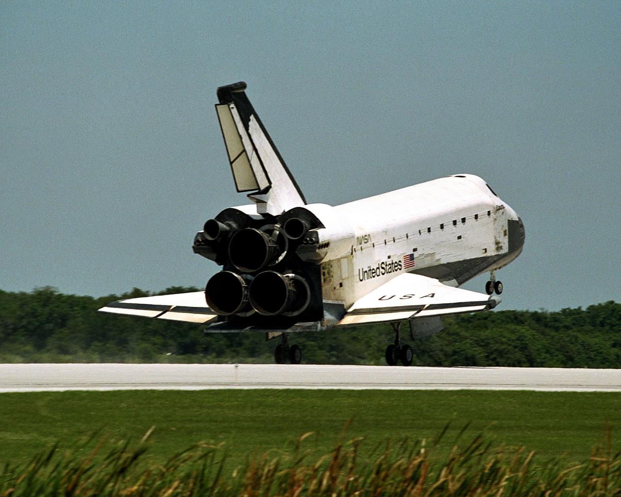 The orbiter Columbia approaches touchdown on Runway 33 of KSC's Shuttle Landing Facility to complete the nearly 16-day STS-90 mission. Main gear touchdown was at 12:08:59 p.m. EDT on May 3, 1998, landing on orbit 256 of the mission. The wheels stopped at 12:09:58 EDT, completing a total mission time of 15 days, 21 hours, 50 minutes and 58 seconds. The 90th Shuttle mission was Columbia's 13th landing at the space center and the 43rd KSC landing in the history of the Space Shuttle program. During the mission, the crew conducted research to contribute to a better understanding of the human nervous system. The crew of the STS-90 Neurolab mission include Commander Richard Searfoss; Pilot Scott Altman; Mission Specialists Richard Linnehan, D.V.M., Dafydd (Dave) Williams, M.D., with the Canadian Space Agency, and Kathryn (Kay) Hire; and Payload Specialists Jay Buckey, M.D., and James Pawelczyk, Ph.D