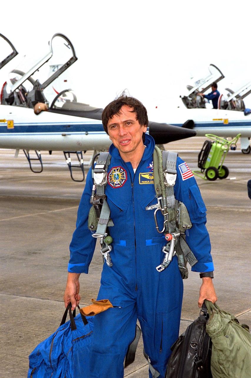 STS-91 Mission Specialist Franklin Chang-Diaz, Ph.D., arrives at Kennedy Space Center's Shuttle Landing Facility aboard a T-38 jet. He is here to participate in the Terminal Countdown Demonstration Test (TCDT), a dress rehearsal for launch. The STS-91 launch is targeted for June 2 with a launch window opening around 6:10 p.m. EDT. The mission will conclude Phase I of the joint U.S.-Russian International Space Station Program. Although it will be the ninth Shuttle docking with the Russian Space Station Mir, it will be the first Mir docking for the Space Shuttle orbiter Discovery. Chang-Diaz is making his sixth space flight. The STS-91 mission will also be the first flight for the new Space Shuttle super lightweight external tank. The STS-91 flight crew also includes Mission Commander Charles Precourt; Pilot Dominic Gorie; and Mission Specialists Wendy B. Lawrence; Janet Lynn Kavandi, Ph.D.; and Valery Ryumin, with the Russian Space Agency. Andrew Thomas, Ph.D., will be returning to Earth with the crew after living aboard Mir since January 25, 1998
