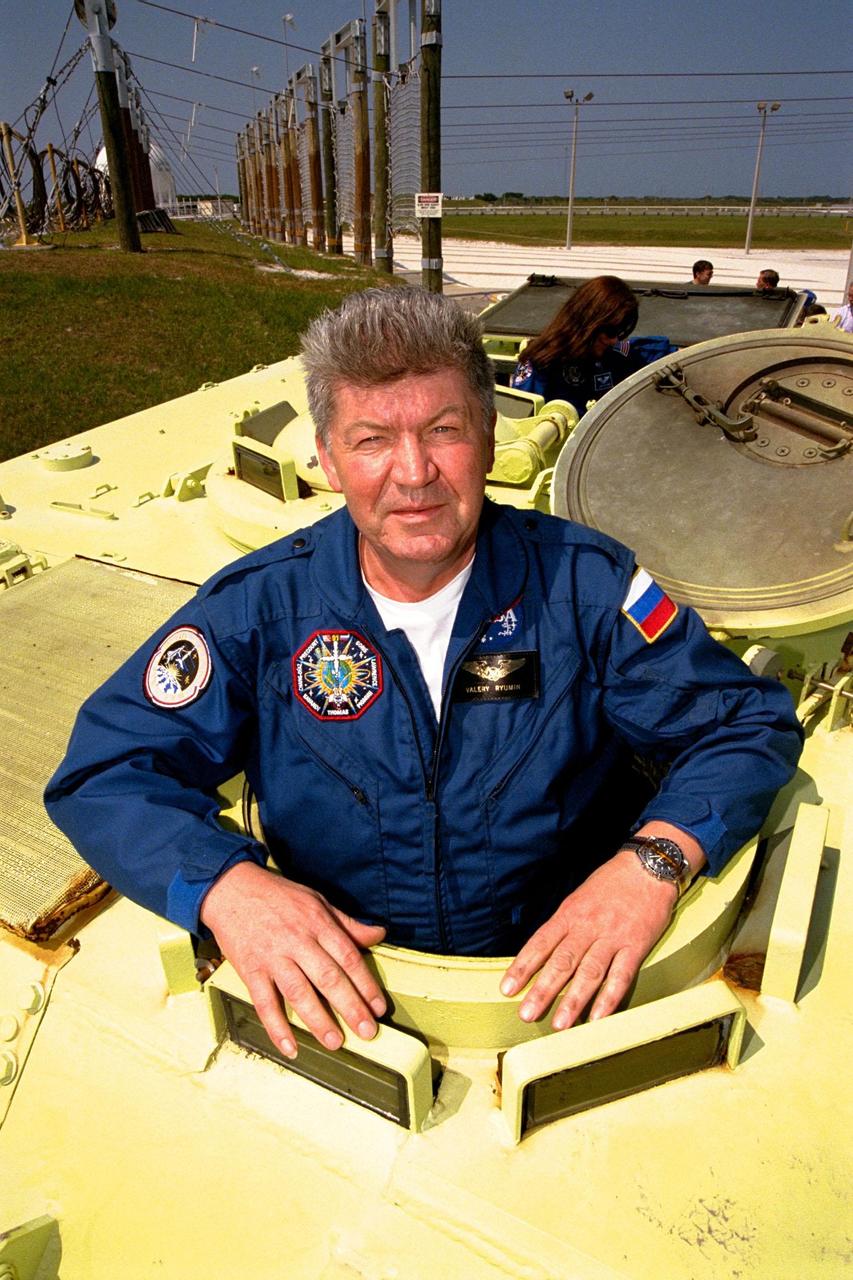 STS-91 Mission Specialist Valery Ryumin, with the Russian Space Agency, is learning how to operate an M-113 armored personnel carrier during Terminal Countdown Demonstration Test (TCDT) training activities. The TCDT is held at KSC prior to each Space Shuttle flight to provide crews with an opportunity to participate in simulated countdown activities. STS-91 is scheduled to be launched on June 2 with a launch window opening around 6:10 p.m. EDT. The mission will feature the ninth Shuttle docking with the Russian Space Station Mir, the first Mir docking for Discovery, the conclusion of Phase I of the joint U.S.-Russian International Space Station Program, and the first flight of the new Space Shuttle super lightweight external tank. The STS-91 flight crew includes Commander Charles Precourt; Pilot Dominic Gorie; and Mission Specialists Wendy B. Lawrence; Franklin Chang-Diaz, Ph.D.; and Janet Kavandi, Ph.D. Andrew Thomas, Ph.D., will be returning to Earth with the crew after living more than four months aboard Mir