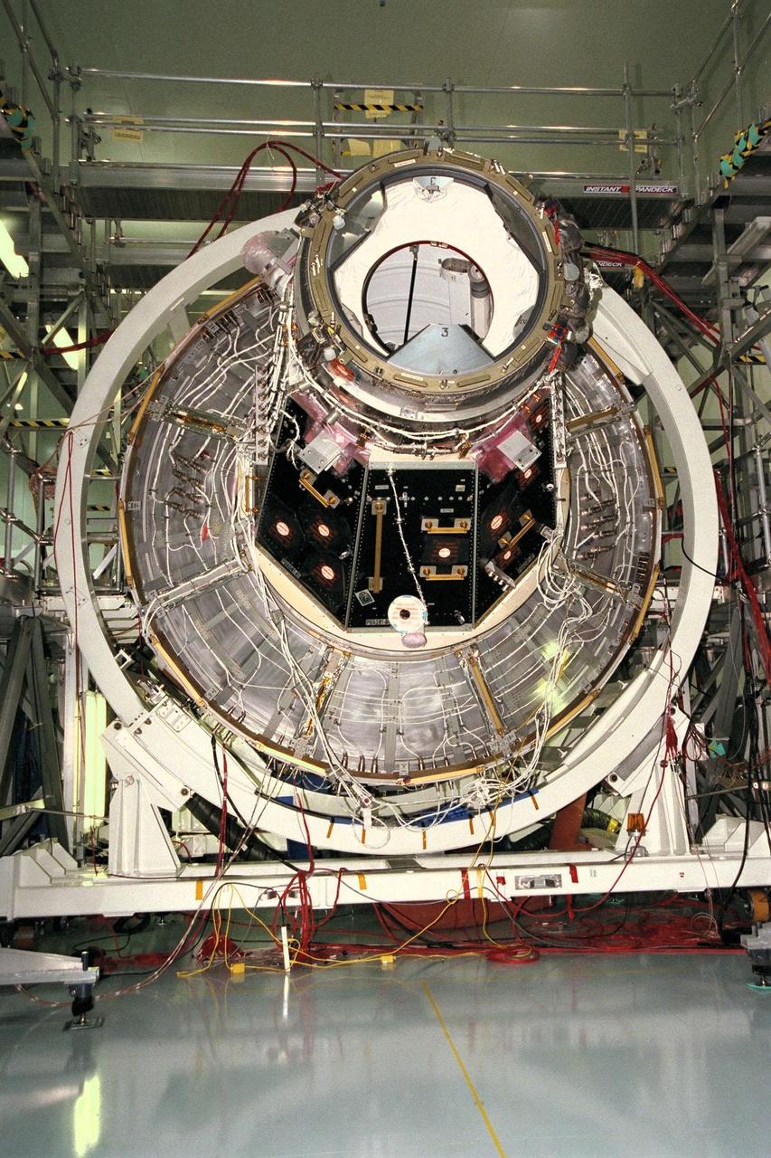 KENNEDY SPACE CENTER, FLA. -- The International Space Station's (ISS) Unity node, with Pressurized Mating Adapter (PMA)-2 attached, awaits further processing in the Space Station Processing Facility (SSPF). The Unity node is the first element of the ISS to be manufactured in the United States and is currently scheduled to lift off aboard the Space Shuttle Endeavour on STS-88 later this year. Unity has two PMAs attached to it now that this mate is completed. PMAs are conical docking adapters which will allow the docking systems used by the Space Shuttle and by Russian modules to attach to the node's hatches and berthing mechanisms. Once in orbit, Unity, which has six hatches, will be mated with the already orbiting Control Module and will eventually provide attachment points for the U.S. laboratory module; Node 3; an early exterior framework or truss for the station; an airlock; and a multi-windowed cupola. The Control Module, or Functional Cargo Block, is a U.S.-funded and Russian-built component that will be launched aboard a Russian rocket from Kazakstan