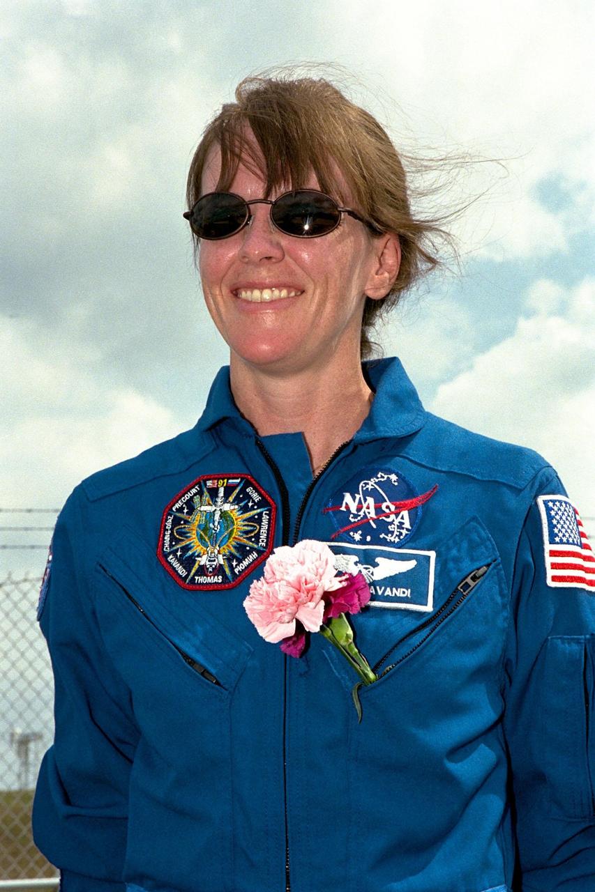 STS-91 Mission Specialist Janet Kavandi, Ph.D., visits Launch Pad 39A from which she is scheduled to be launched aboard Space Shuttle Discovery on June 2 around 6:10 p.m. EDT. In her pocket are flowers intended as gifts for her two children whom she will be seeing shortly. STS-91 will feature the ninth Shuttle docking with the Russian Space Station Mir, the first Mir docking for Discovery, the conclusion of Phase I of the joint U.S.-Russian International Space Station Program, and the first flight of the new Space Shuttle super lightweight external tank. The STS-91 flight crew also includes Commander Charles Precourt; Pilot Dominic Gorie; and Mission Specialists Franklin Chang-Diaz, Ph.D.; Wendy B. Lawrence; and Valery Ryumin, with the Russian Space Agency. Andrew Thomas, Ph.D., will be returning to Earth with the crew after living more than four months aboard Mir