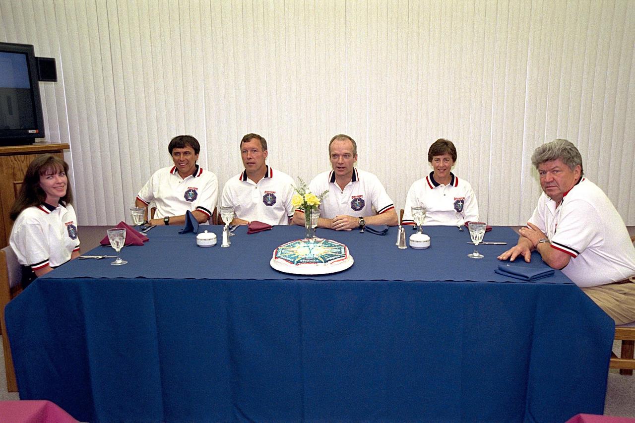 The STS-91 crew partakes in the traditional breakfast in the crew quarters at the Operations and Checkout (O&C) Building prior to their suitup for their trip to Launch Pad 39A.They are (from left): Mission Specialists Janet Lynn Kavandi and Franklin R. Chang-Diaz ; Pilot Dominic L. Gorie; Mission Commander Charles J. Precourt; and Mission Specialists Wendy B. Lawrence and Valery Victorovitch Ryumin. STS-91 is scheduled to be launched on June 2 with a launch window opening around 6:10 p.m. EDT. The mission will feature the ninth and final Shuttle docking with the Russian space station Mir, the first Mir docking for Discovery, the first on-orbit test of the Alpha Magnetic Spectrometer (AMS), and the first flight of the new Space Shuttle super lightweight external tank. Astronaut Andrew S. W. Thomas will be returning to Earth as a STS-91 crew member after living more than four months aboard Mir