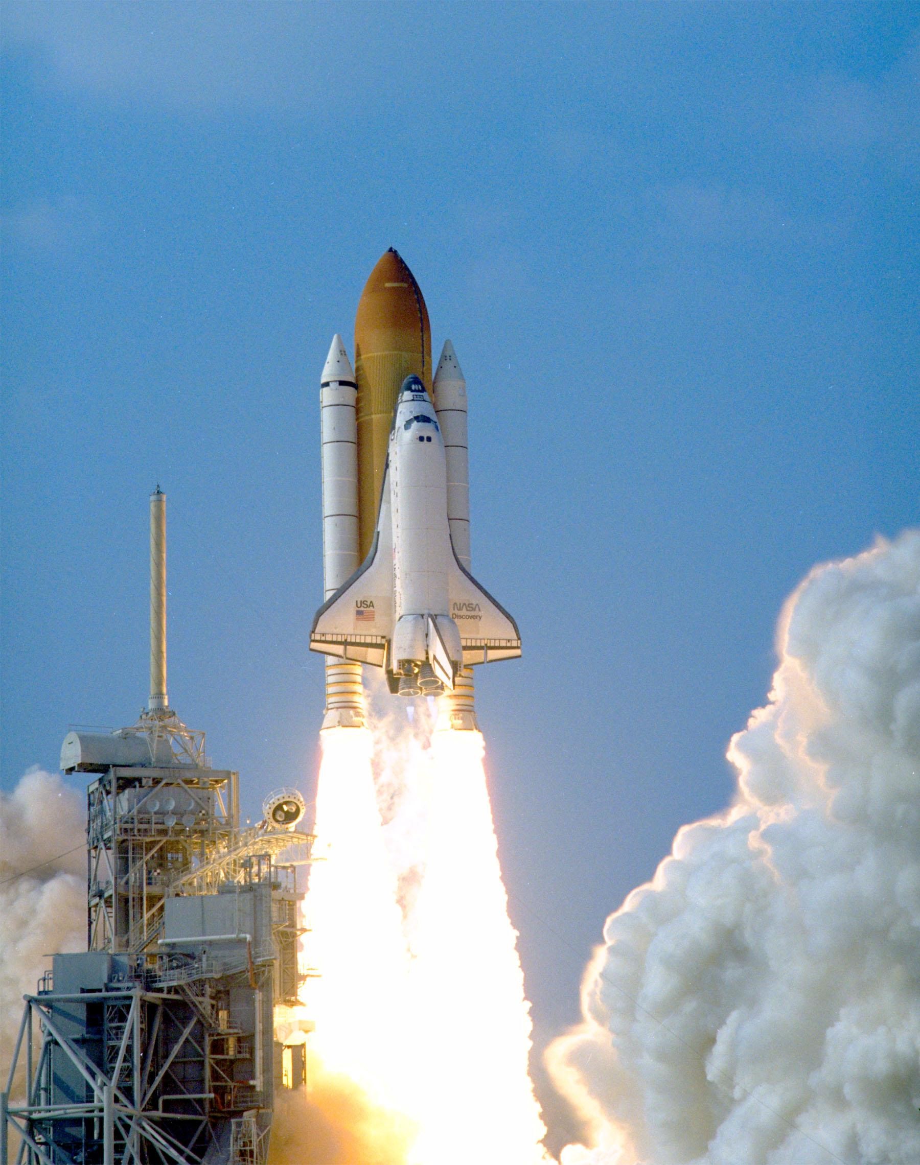 The last mission of the Shuttle-Mir program begins as the Space Shuttle Discovery lifts off from Launch Pad.