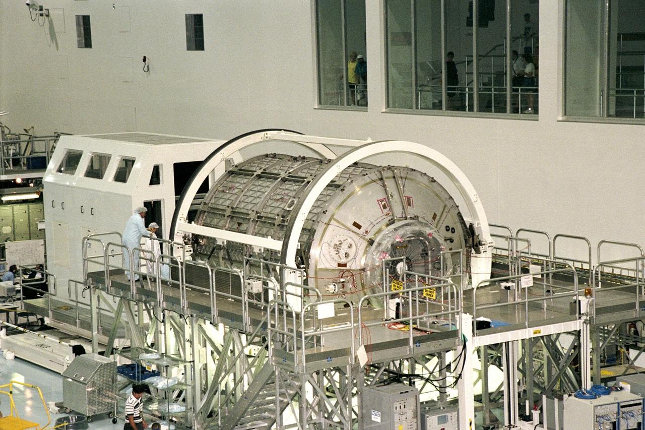 The first Multi-Purpose Logistics Module (MPLM) for the International Space Station (ISS) sits on the work stand where it will undergo testing in the Space Station Processing Facility. The Italian-built module, named Leonardo, is one of three from Alenia Aerospazio, and will be operated by NASA and supported by ASI, the Italian space agency. The MPLMs will be carried in the payload bay of a Shuttle orbiter, and will provide storage and additional work space for up to two astronauts when docked to the ISS. Leonardo is scheduled to be launched on STS-100 in December 1999. The second MPLM, named Raffaello, is scheduled to be handed over in April 1999. A third module, to be named Donatello, is due to be delivered in October 2000 for launch in January 2001