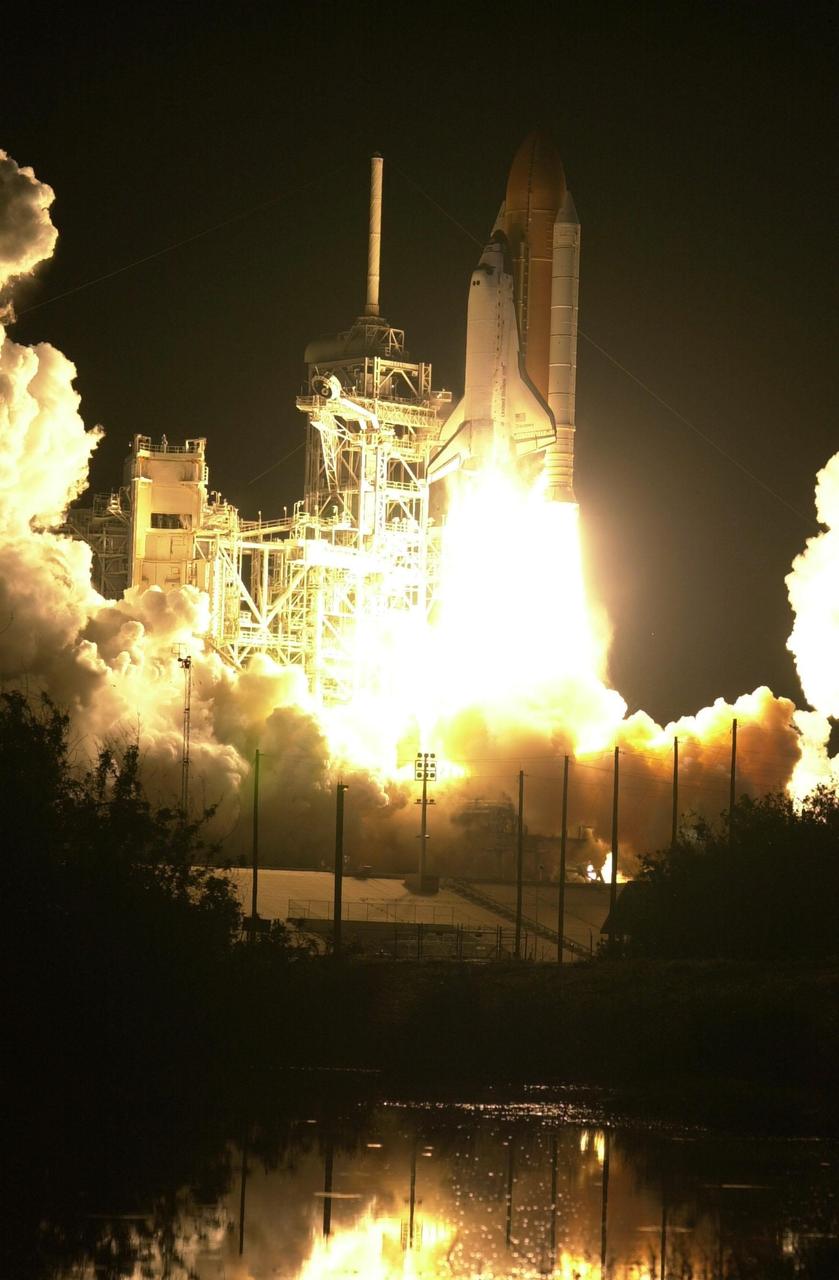(Nikon camera D1 test)The blazing light of Space Shuttle Discovery's launch turns night into day at Launch Pad 39B. The successful liftoff occurred on time at 7:50:00.069 EST from Launch Pad 39B on mission STS-103. On board are Commander Curtis L. Brown Jr., Pilot Scott J. Kelly and Mission Specialists Steven L. Smith, C. Michael Foale (Ph.D.), John M. Grunsfeld (Ph.D.), Claude Nicollier of Switzerland and Jean-François Clervoy of France. Nicollier and Clervoy are with the European Space Agency. STS-103 is a Hubble Servicing Mission, with three planned space walks designed to install new equipment and replace old. The primary objective is to replace the gyroscopes that make up the three Rate Sensor Units. Extravehicular activities include installing a new computer, changing out one of the Fine Guidance Sensors, replacing a tape recorder with a new solid state recorder, and installing a voltage/temperature improvement kit, and begin repairing the insulation on the telescope's outer surface. After the 7-day, 21-hour mission, Discovery is expected to land at KSC Monday, Dec. 27, at about 5:24 p.m. EST. This is the 27th flight of Discovery and the 96th mission in the Space Shuttle Program. It is the third launch at Kennedy Space Center in 1999