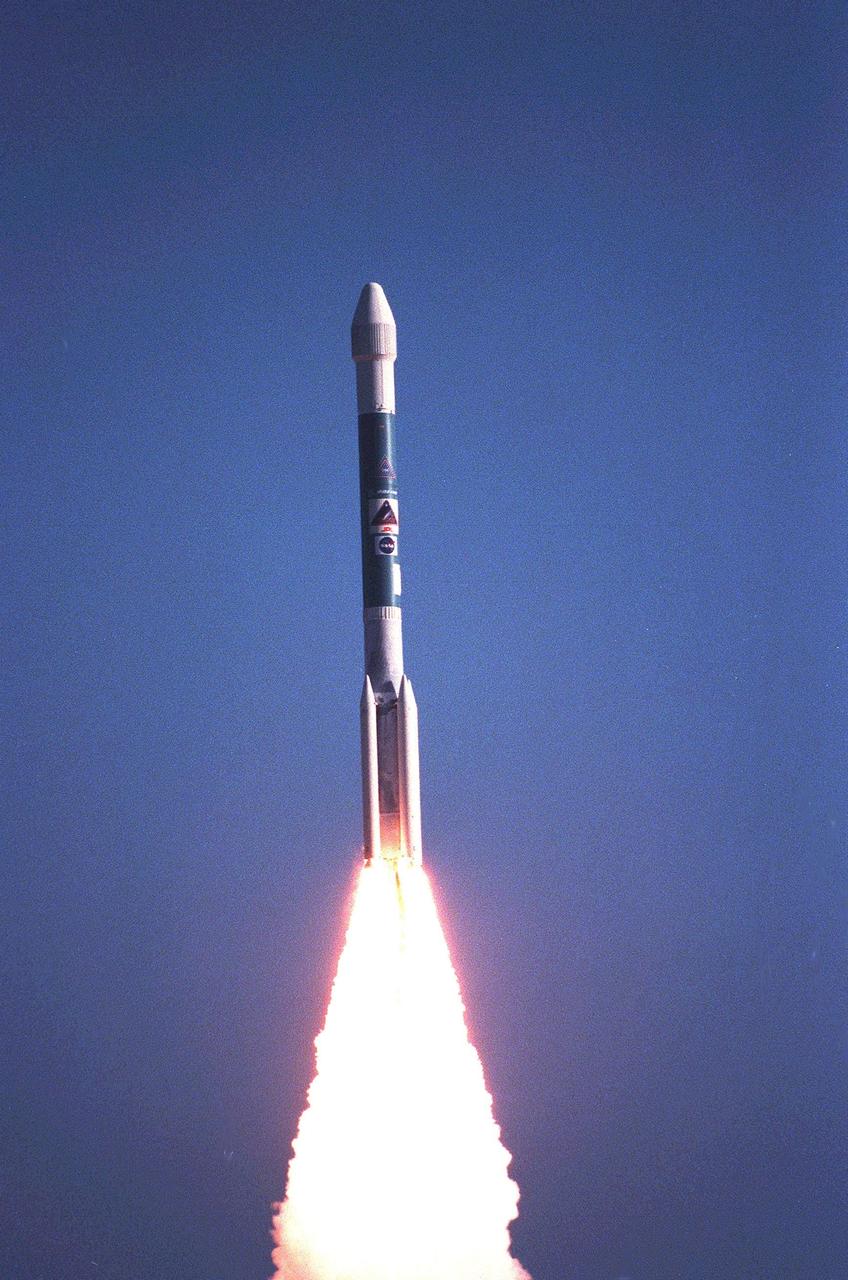 Flames sear the pristine blue sky behind the Boeing Delta II rocket carrying the Stardust spacecraft after the 4:04:15 p.m. launch from Launch Pad 17-A, Cape Canaveral Air Station. A 24-hour scrub postponed the launch from the originally scheduled date of Feb. 6. Stardust is destined for a close encounter with the comet Wild 2 in January 2004. Using a silicon-based substance called aerogel, Stardust will capture comet particles flying off the nucleus of the comet. The spacecraft also will bring back samples of interstellar dust. These materials consist of ancient pre-solar interstellar grains and other remnants left over from the formation of the solar system. Scientists expect their analysis to provide important insights into the evolution of the sun and planets and possibly into the origin of life itself. The collected samples will return to Earth in a sample return capsule to be jettisoned as Stardust swings by Earth in January 2006