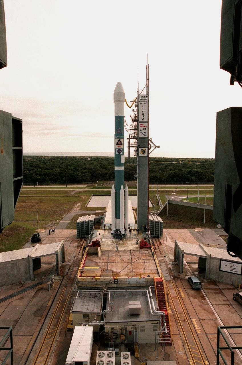 KENNEDY SPACE CENTER, FLA. -- After launch tower rollback, the Boeing Delta II rocket carrying NASA's Mars Polar lander awaits liftoff, scheduled for 3:21 p.m. EST, at Launch Complex 17B, Cape Canaveral Air Station. The lander is a solar-powered spacecraft designed to touch down on the Martian surface near the northern-most boundary of the south pole in order to study the water cycle there. The lander also will help scientists learn more about climate change and current resources on Mars, studying such things as frost, dust, water vapor and condensates in the Martian atmosphere. It is the second spacecraft to be launched in a pair of  Mars Surveyor '98 missions