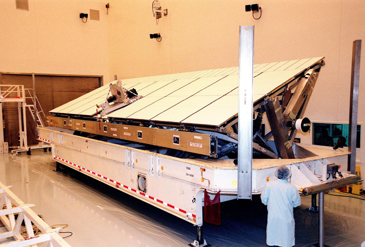 The Shuttle Radar Topography Mission (SRTM) sits inside the Multi-Payload Processing Facility after the SRTM's cover was removed. The primary payload on mission STS-99, the SRTM consists of a specially modified radar system that will fly onboard the Space Shuttle during the 11-day mission scheduled for September 1999. This radar system will gather data that will result in the most accurate and complete topographic map of the Earth's surface that has ever been assembled. SRTM is an international project spearheaded by the National Imagery and Mapping Agency and NASA, with participation of the German Aerospace Center DLR. Its objective is to obtain the most complete high-resolution digital topographic database of the Earth