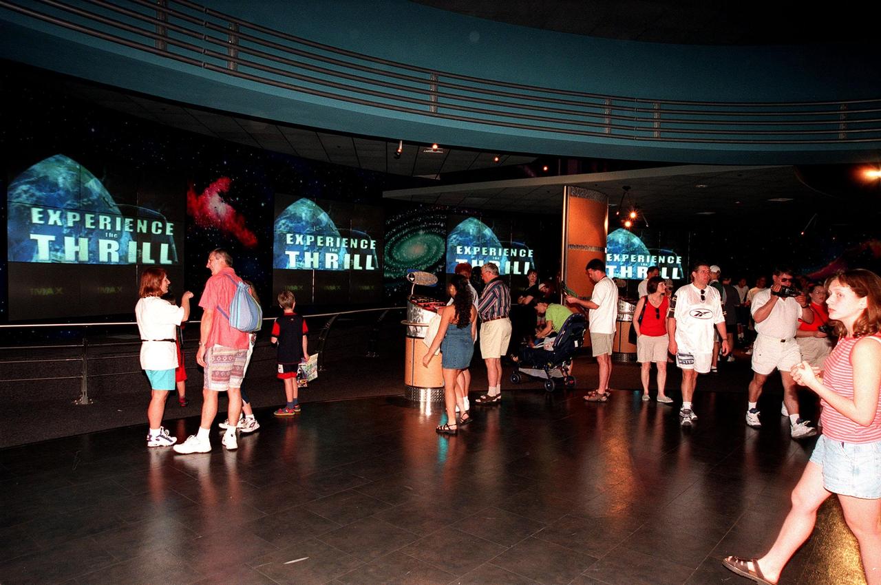 KENNEDY SPACE CENTER, FLA. -- Part of the $13 million expansion to KSC's Visitor Complex, the new information center welcomes visitors to the Gateway to the Universe. The five large video walls provide an orientation video, with an introduction to the range of activities and exhibits, and honor the center's namesake, President John F. Kennedy. Other new attractions are an information center, a walk-through Robot Scouts exhibit, a wildlife exhibit, and the film Quest for Life in a new 300-seat theater. The KSC Visitor Complex was inaugurated three decades ago and is now one of the top five tourist attractions in Florida. It is located on S.R. 407, east of I-95, within the Merritt Island National Wildlife Refuge