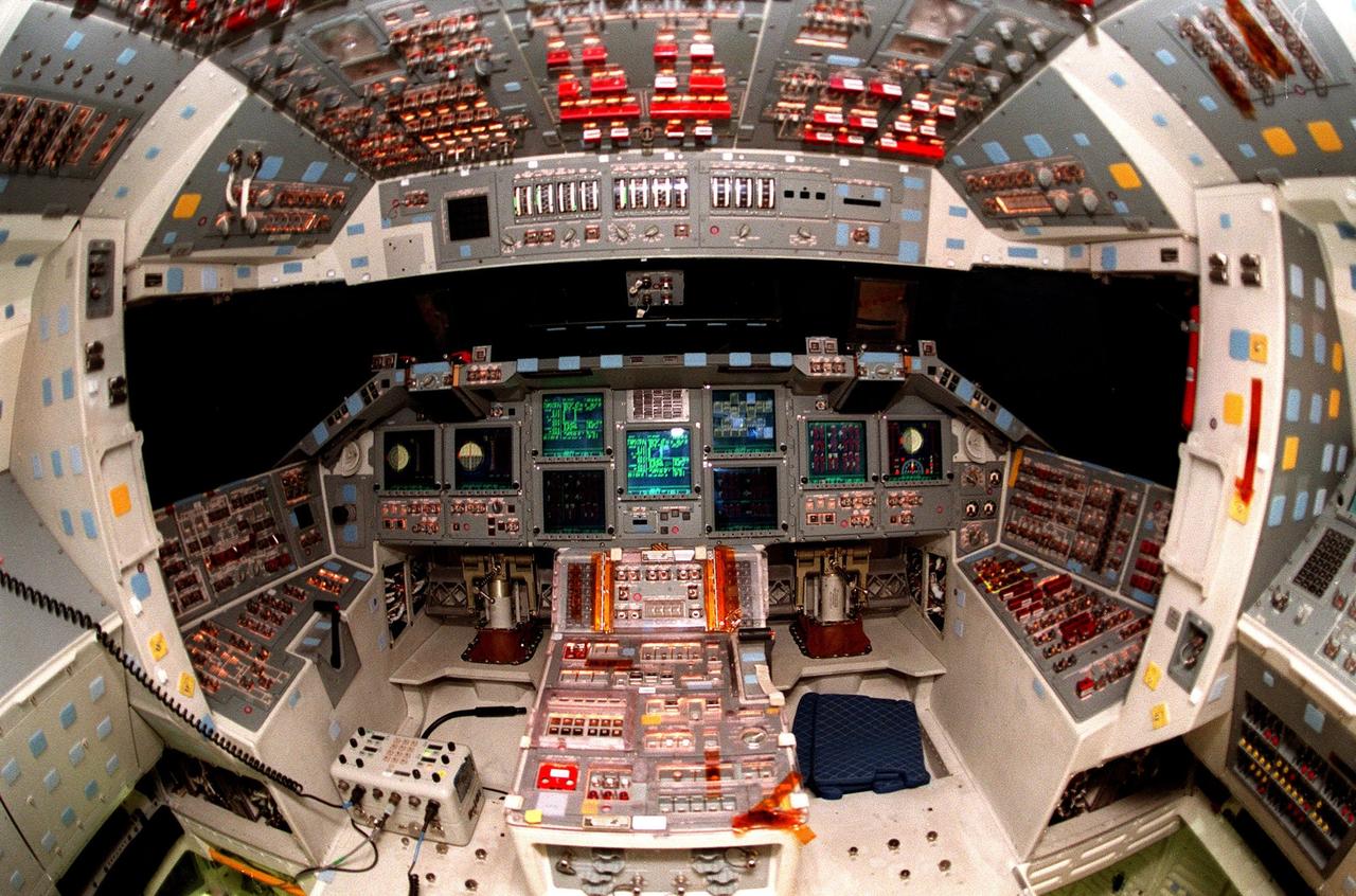 KENNEDY SPACE CENTER, FLA. -- The cockpit of the orbiter Atlantis is seen in the round, revealing the new full-color flat panel Multifunction Electronic Display Subsystem (MEDS), also called the "glass cockpit." The recently installed MEDS upgrade improves crew/orbiter interaction with easy-to-read, graphic portrayals of key flight indicators like attitude display and mach speed. The installation makes Atlantis the most modern orbiter in the fleet and equals the systems on current commercial jet airliners and military aircraft. Atlantis is scheduled to fly on mission STS-101 in early December