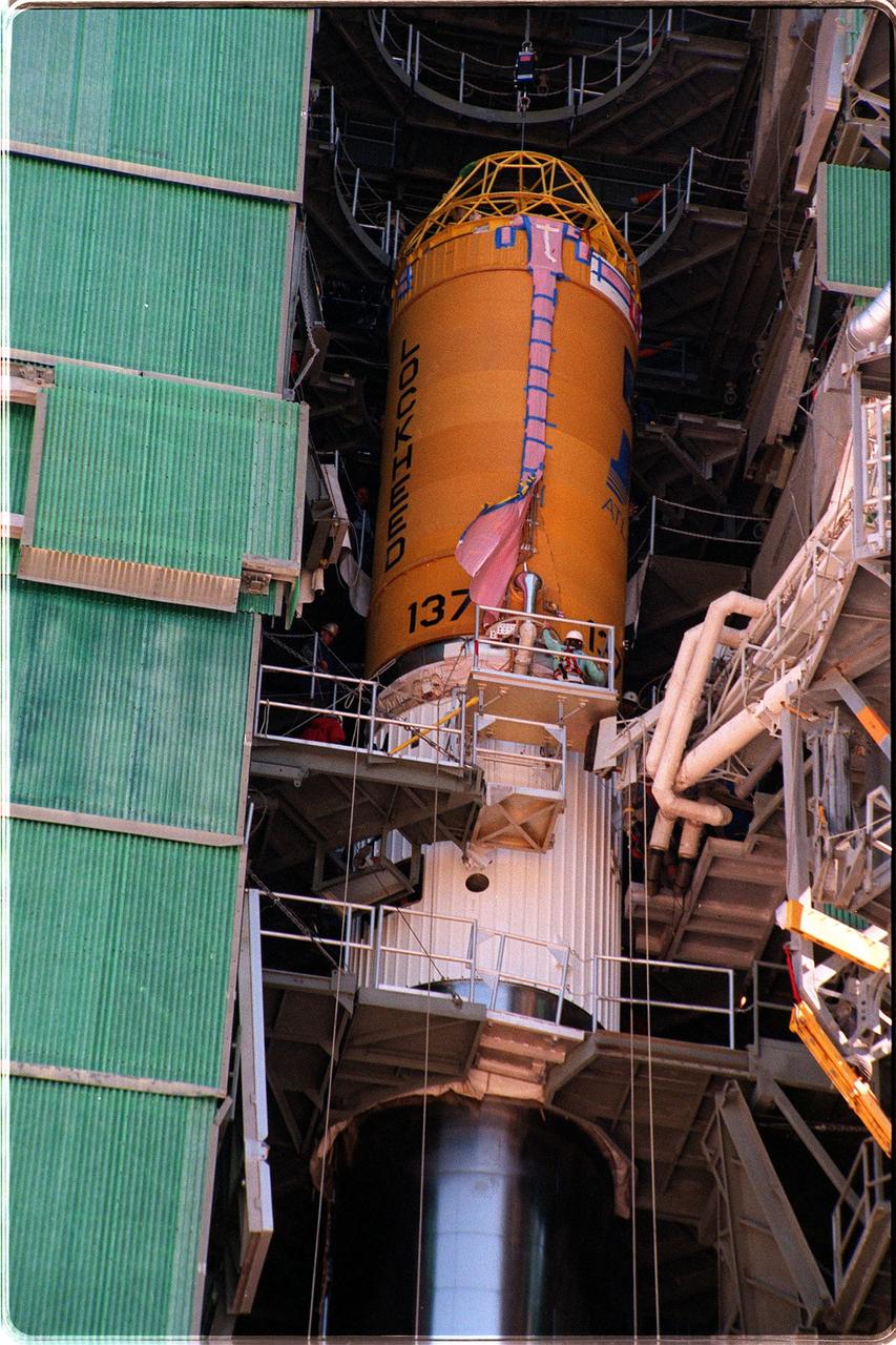 At Launch Pad 36A, Cape Canaveral Air Station, a Centaur upper stage is mated to the lower stage Lockheed Martin Atlas IIA rocket. The rocket is scheduled to launch the NASA GOES-L satellite on May 15, at the opening of a launch window which extends from 2:23 to 4:41 a.m. EDT. Once in orbit, the satellite will become GOES-11, joining GOES-8, GOES-9 and GOES-10 in space. The fourth of a new advanced series of geostationary weather satellites for the National Oceanic and Atmospheric Administration (NOAA), GOES-L is a three-axis inertially stabilized spacecraft that will provide pictures and perform atmospheric sounding at the same time. Once launched, the satellite will undergo checkout and then provide backup capabilities for the existing, aging operational satellites